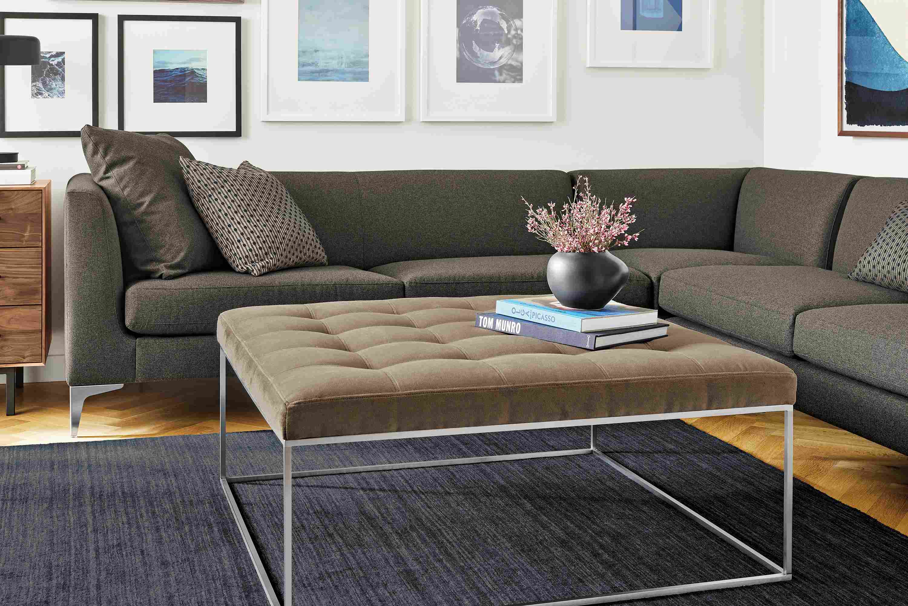 Living room with Tyne square bench in Windsor Otter and Sterling sectional in Myers Charcoal.