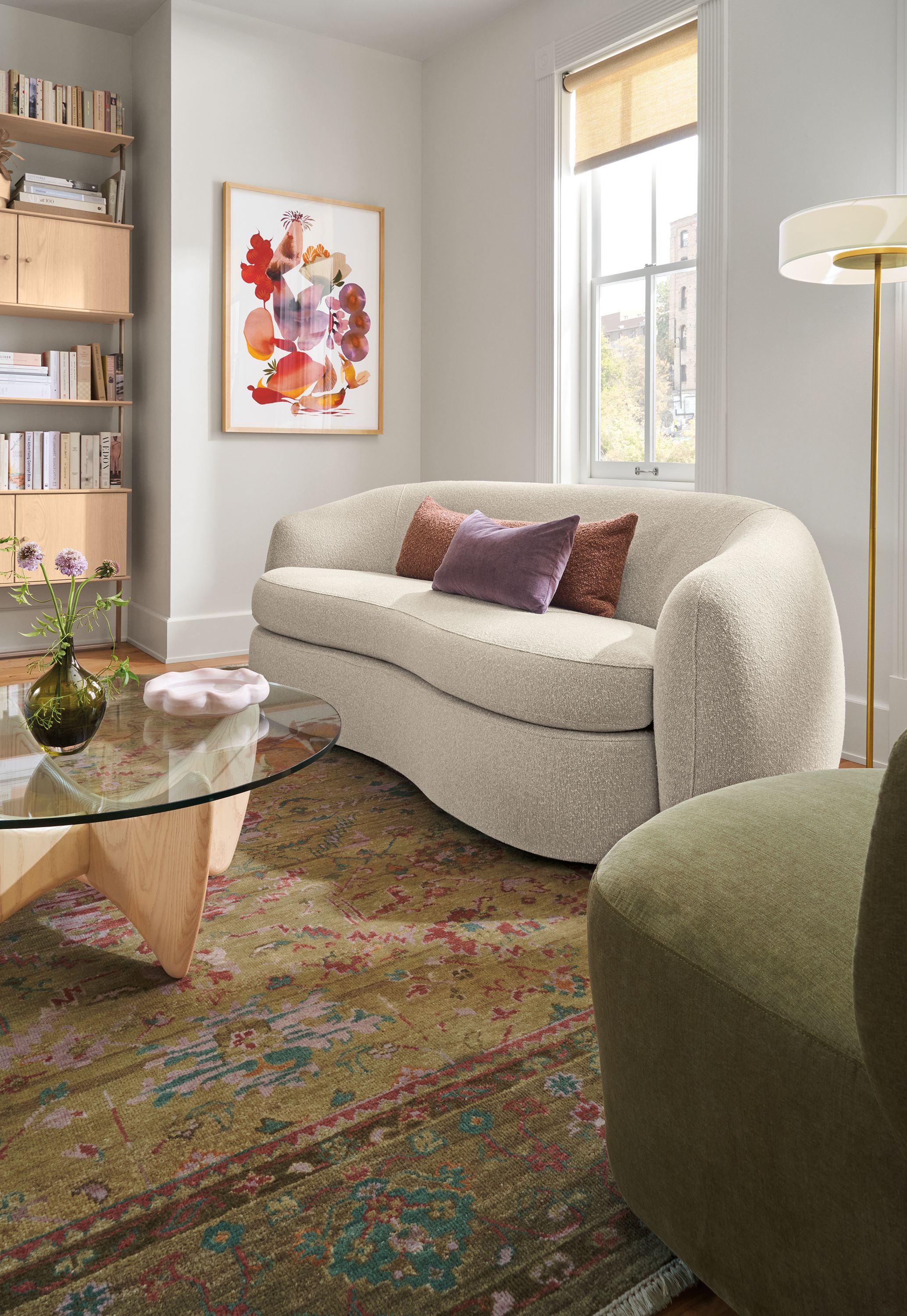 Living room with Valora 86-wide benchseat sofa in conley natural, sundar 8 by 10 rug in moss and cohen floor lamp in satin brass.