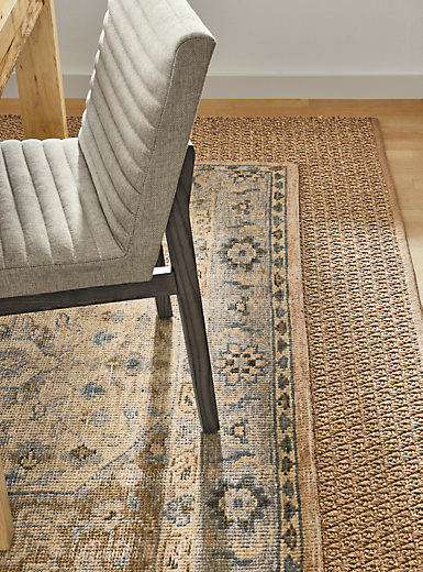 detail of veda rug, essence rug, walsh table, olsen side chair.