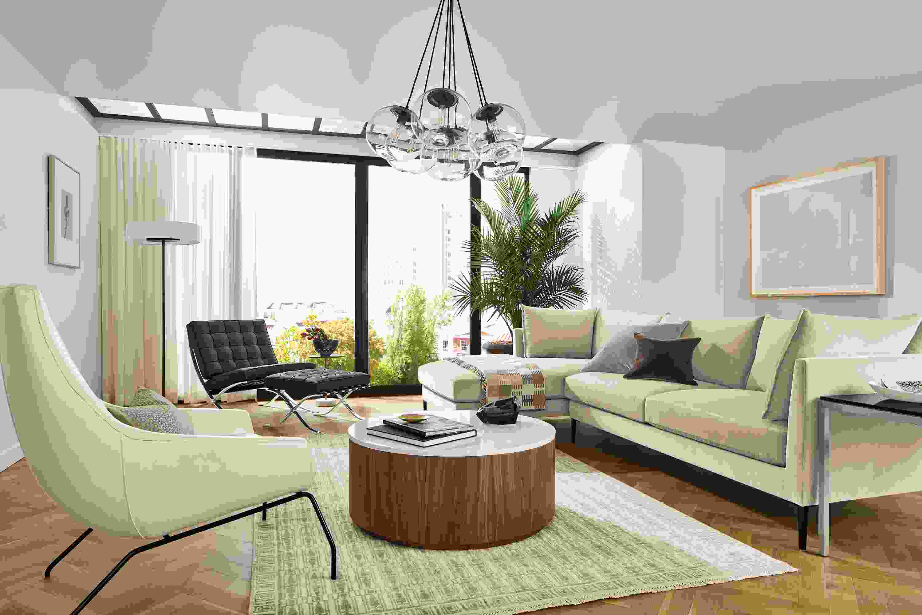 Living room with vela sofa in Banks Natural, seville chair and rhodes lounge chair.