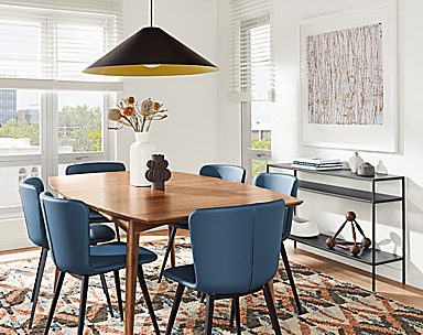 dining room with ventura extension table in walnut and delilah dining chairs with blue leather seats