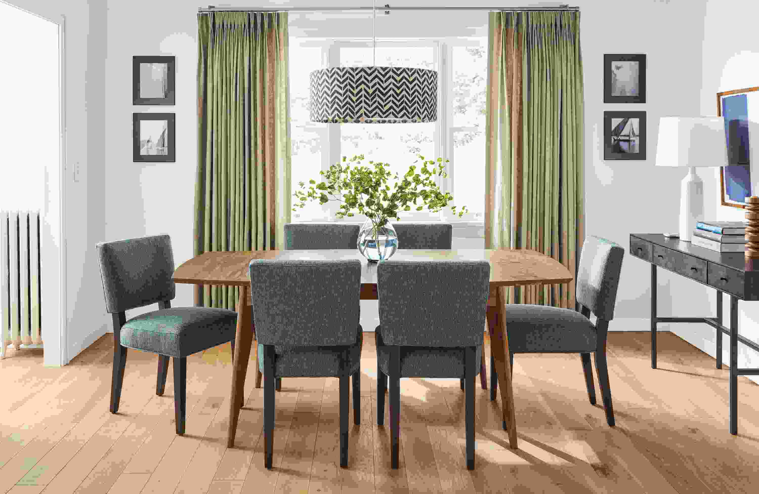 Dining room with Ventura extension dining table in walnut, Georgia side chairs in Tepic Haze and Hudson desk.
