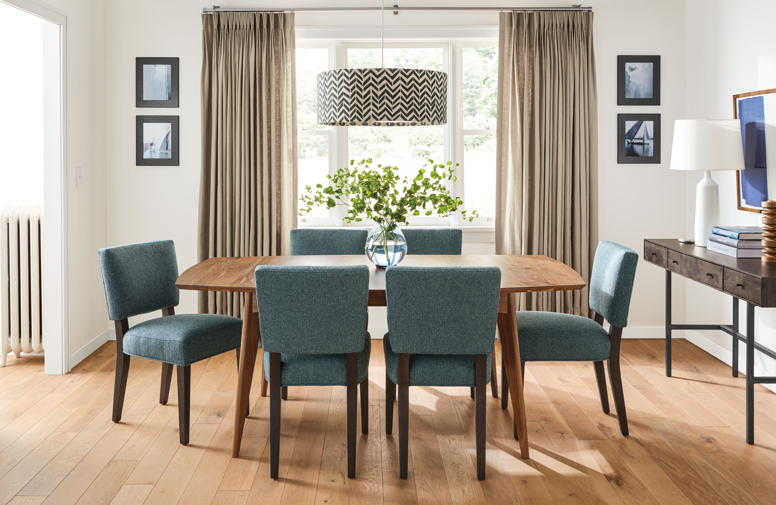 Dining room with Ventura extension dining table in walnut, Georgia side chairs in Tepic Haze and Hudson desk.