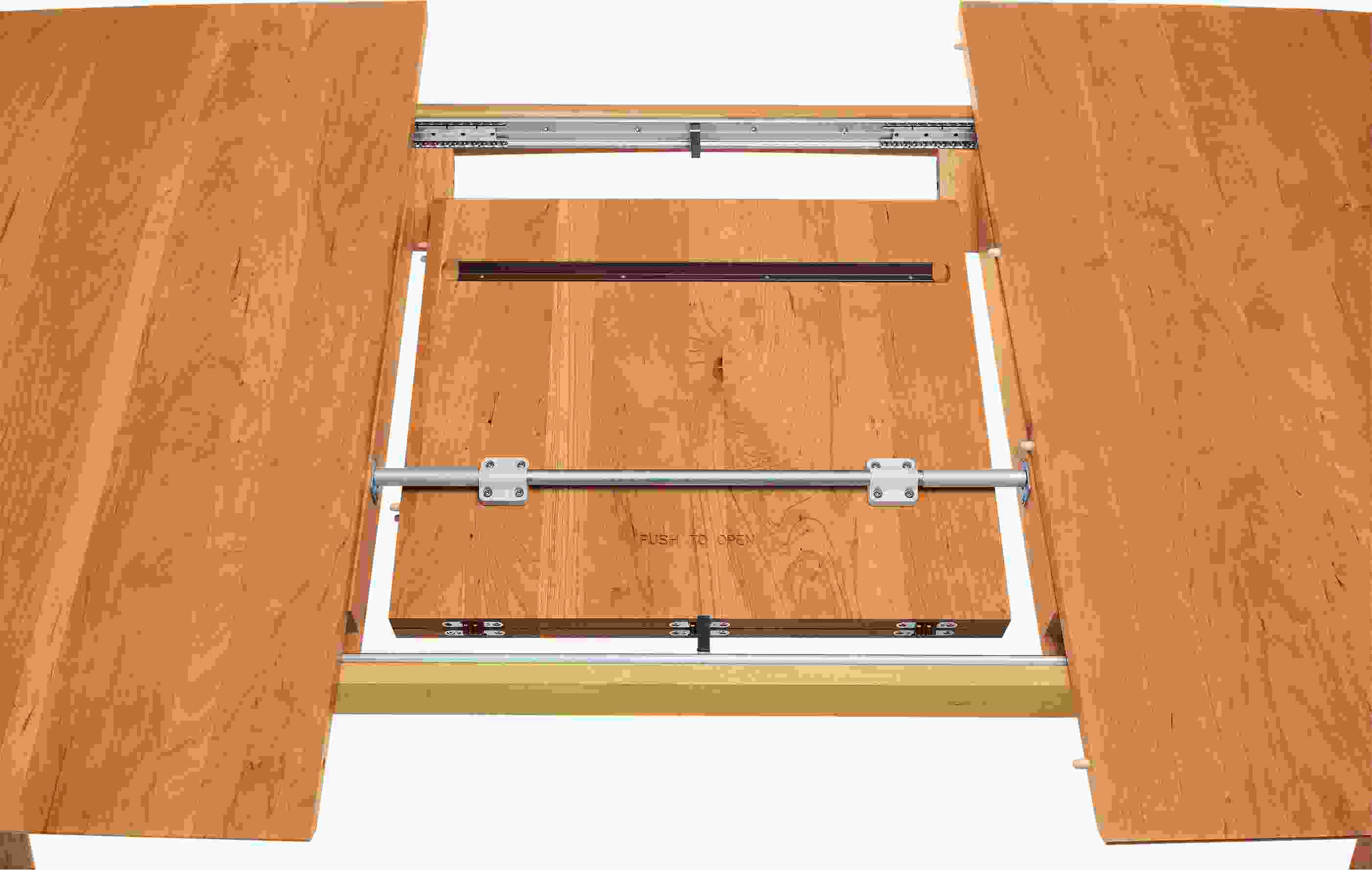 Detail of Ventura 84w 42d 29h Extension Table mechanism.