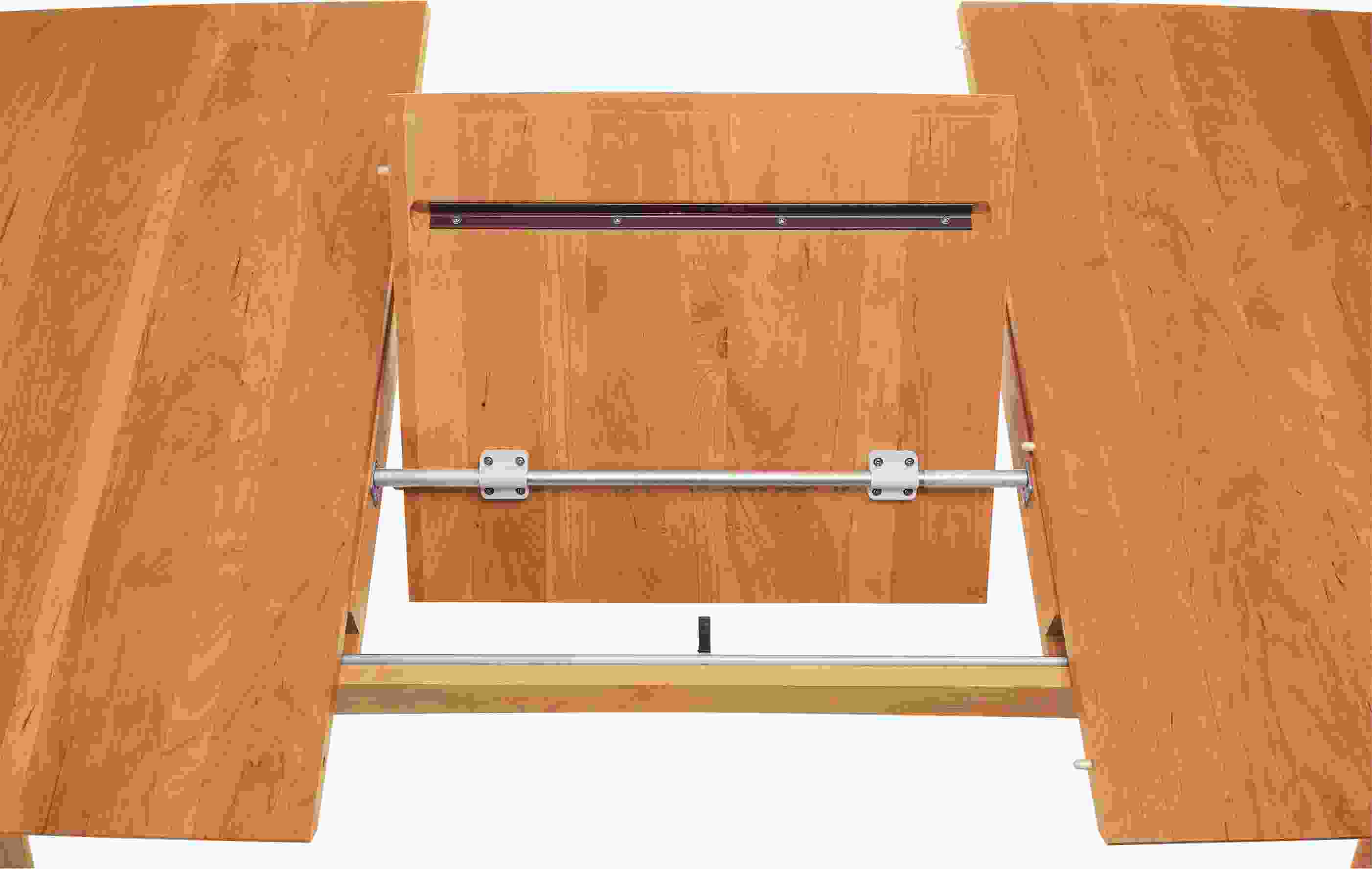 Detail of Ventura 84w 42d 29h Extension Table mechanism showing leaf turning.