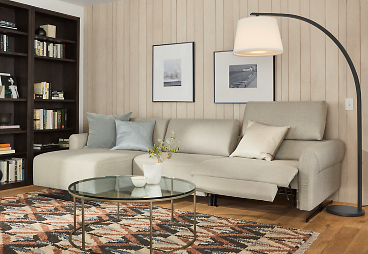 living room with vesna sofa in white fabric with one headrest extended and one footrest extended