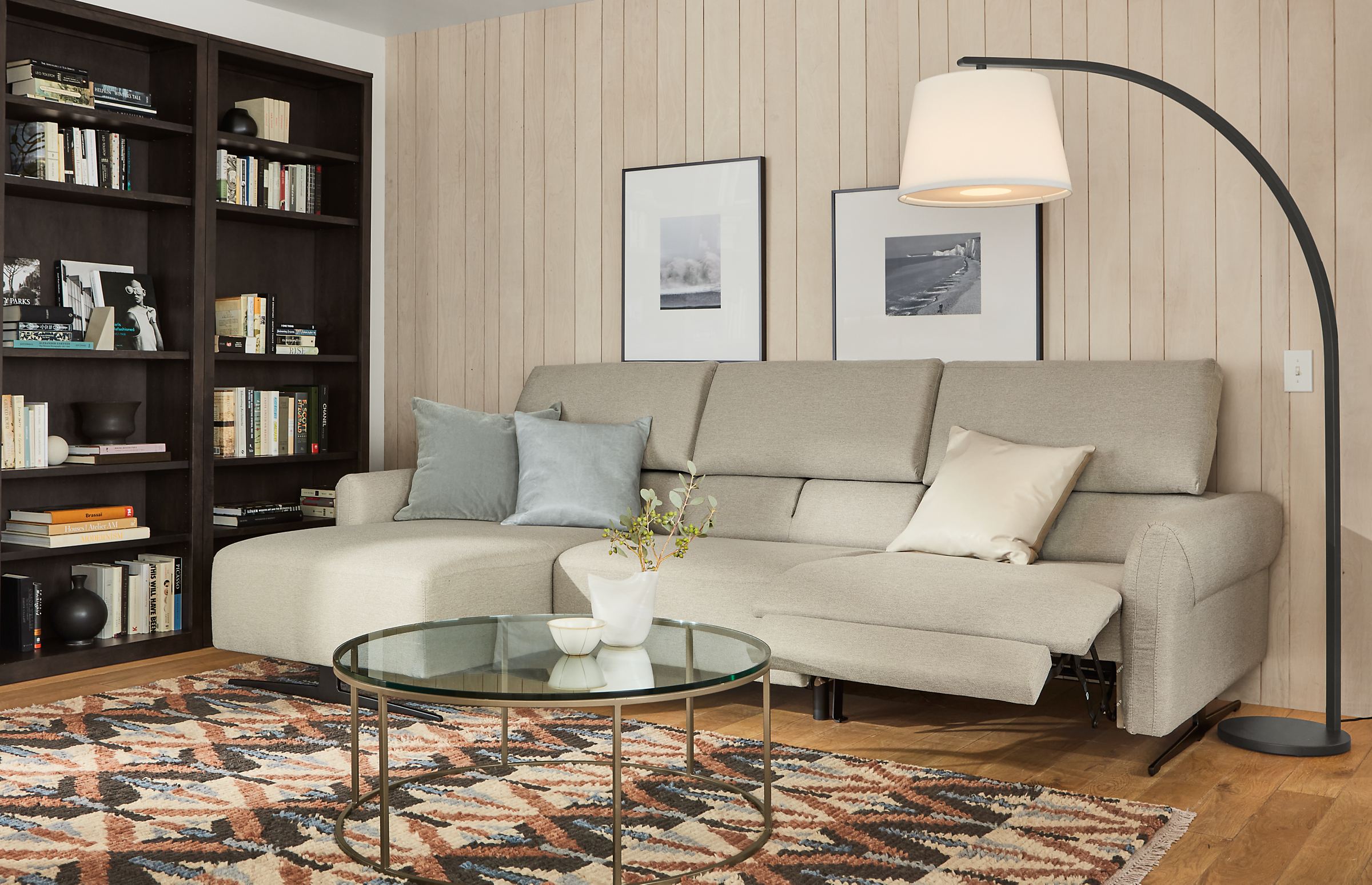 living room with vesna sofa in white fabric with three headrests extended and one footrest extended