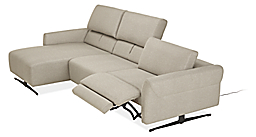 Detail of Vesna 3 piece sofa chaise with power in fabric shown in recline position with headrest raised on middle and chaise pieces.