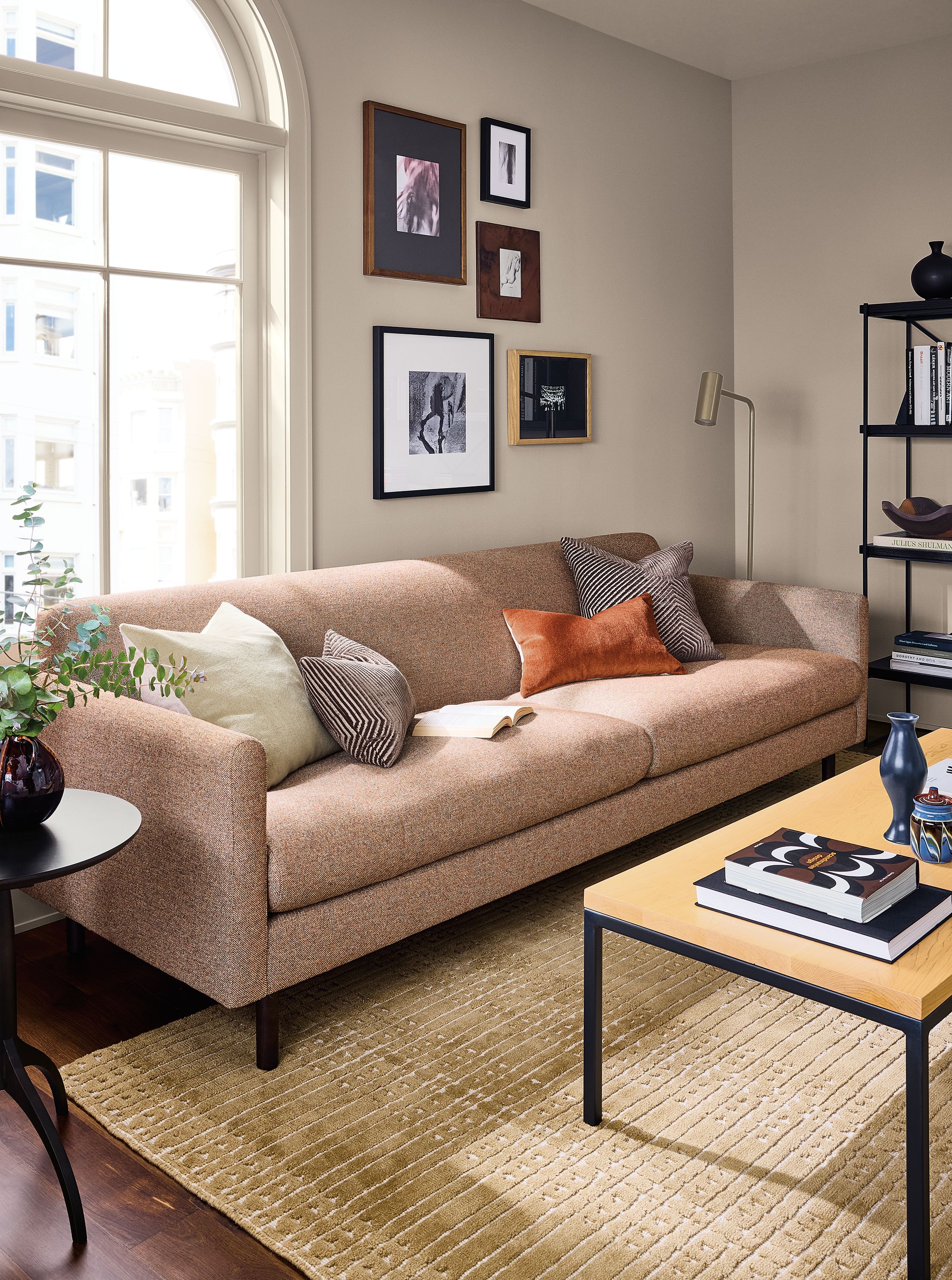 Living room with Vienna sofa in Tatum Clay and Bria 8 by 10 rug in mustard.