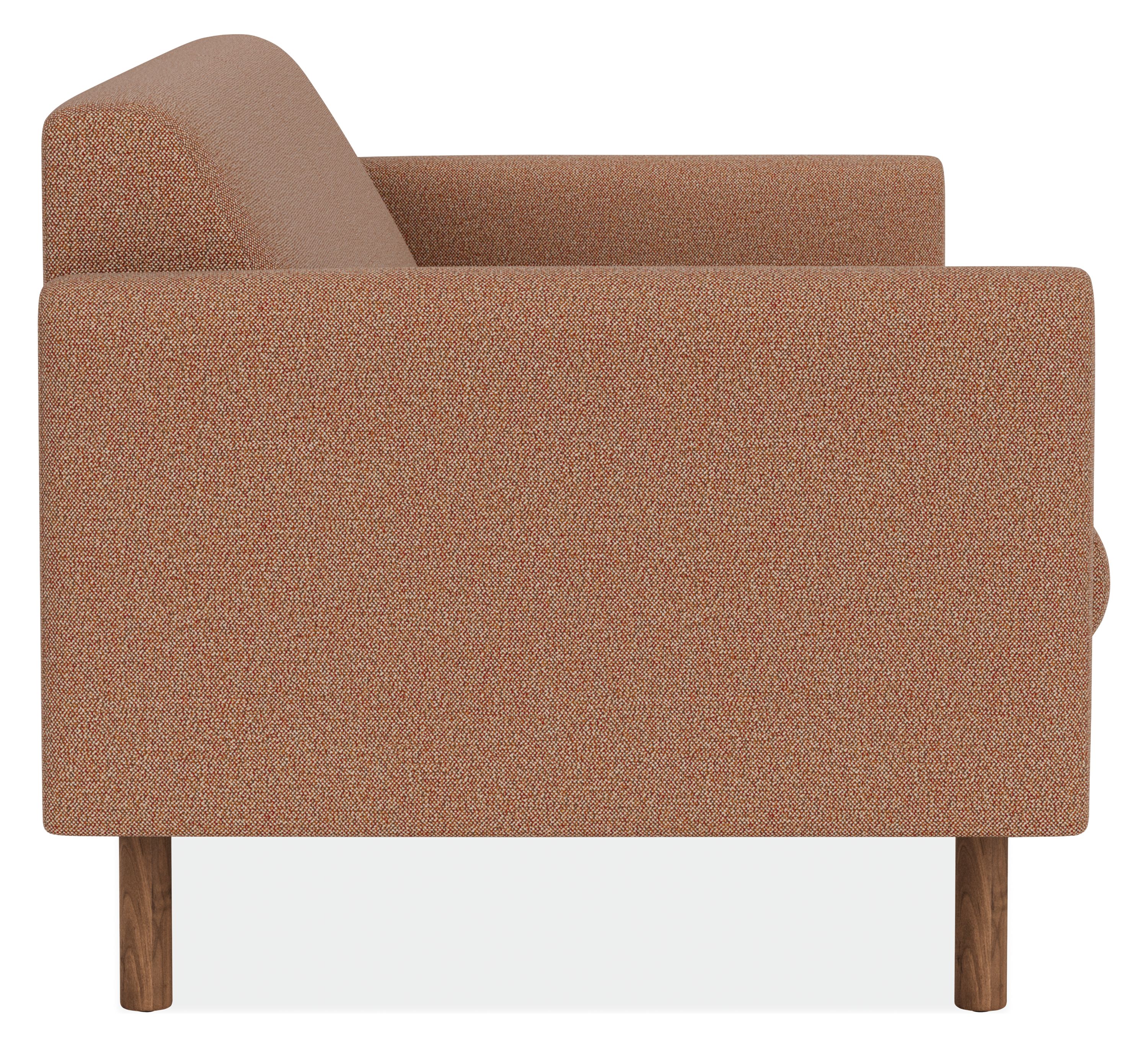 Side view of Vienna 80-wide Sofa in Tatum Clay Fabric and Walnut legs.
