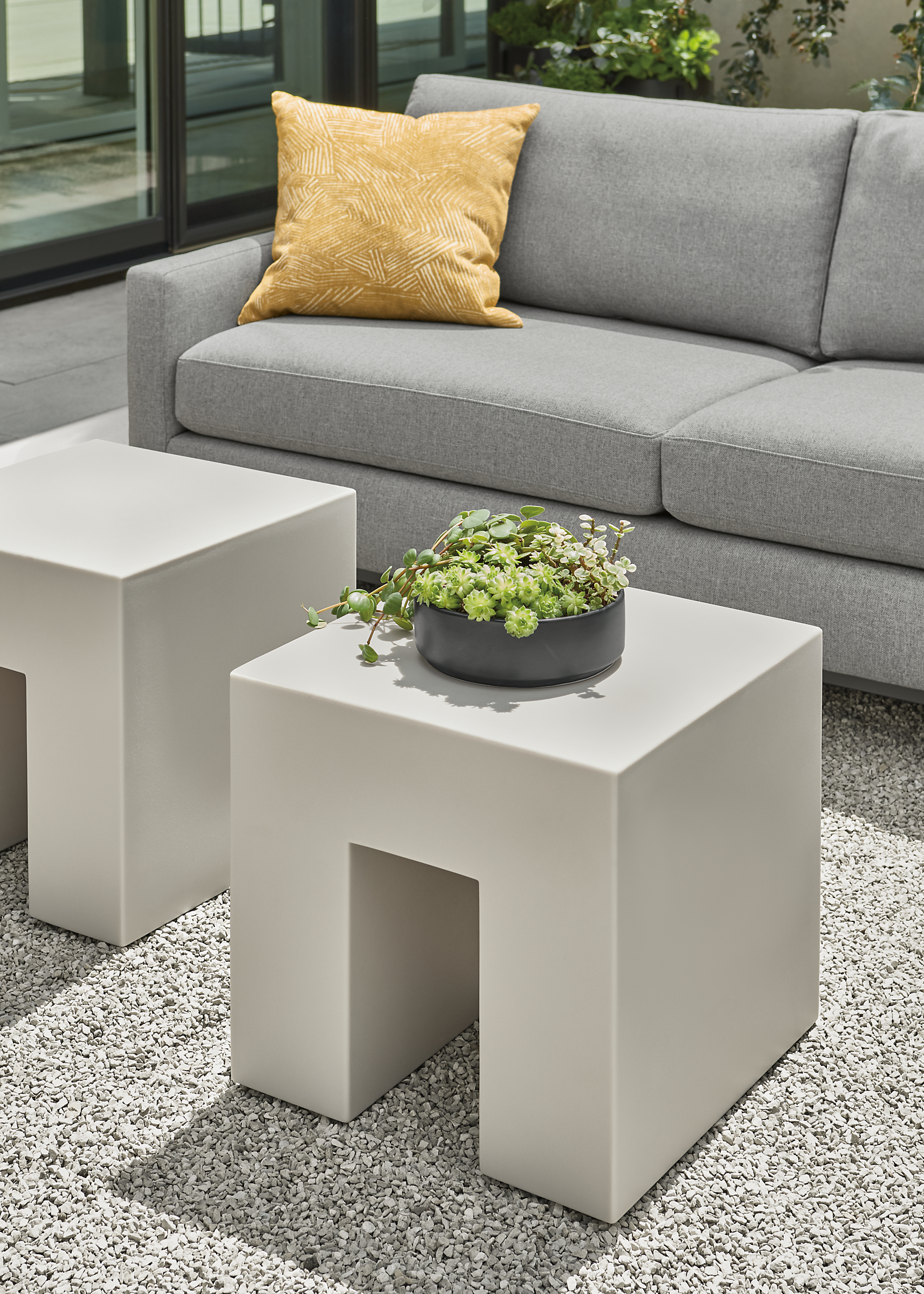 Two Vignelli 18-square outdoor cubes in light grey with Tomas outdoor sofa in Mist fabric.