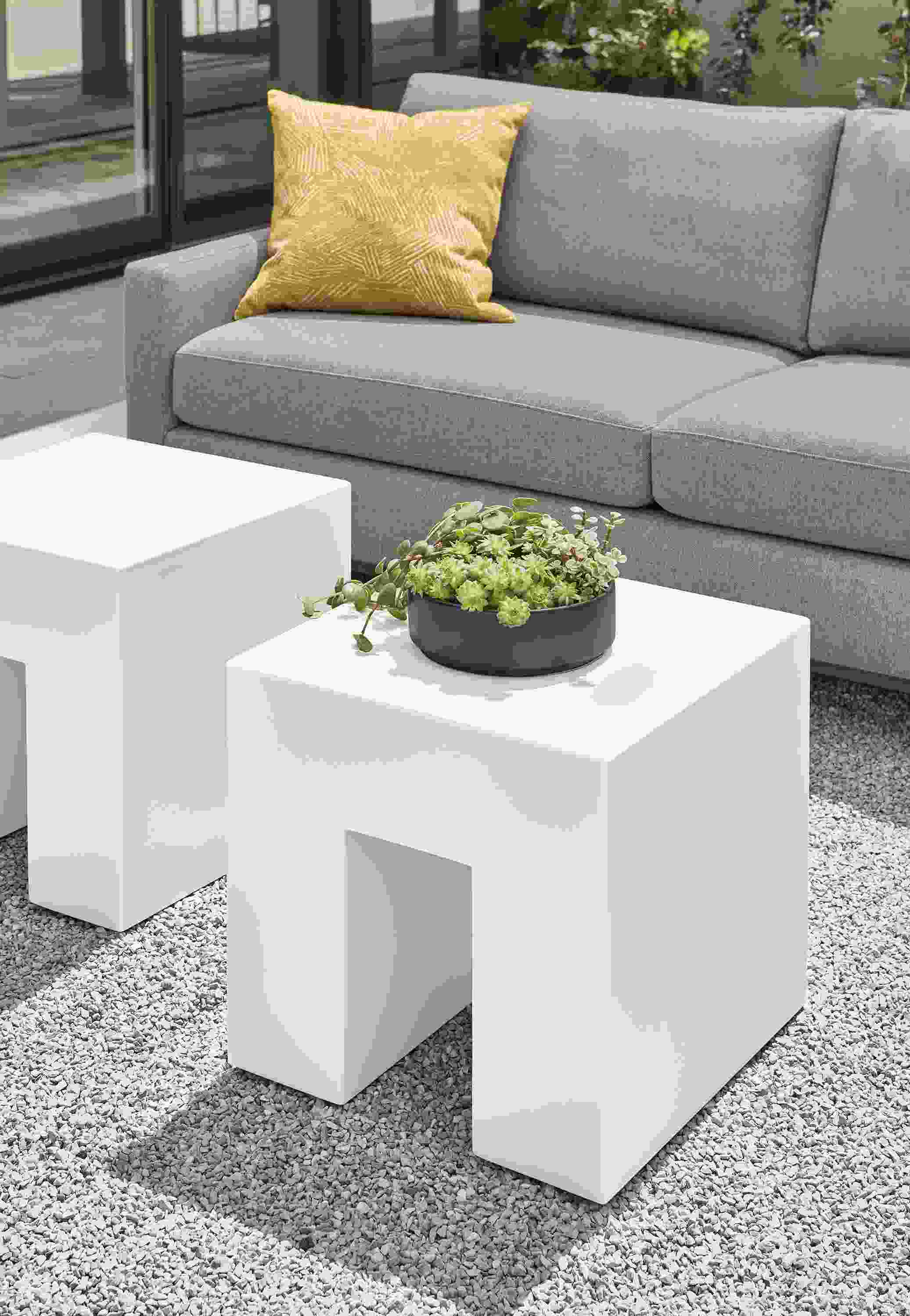 Two Vignelli 18-square outdoor cubes in bone with Tomas outdoor sofa in Mist Steel fabric.