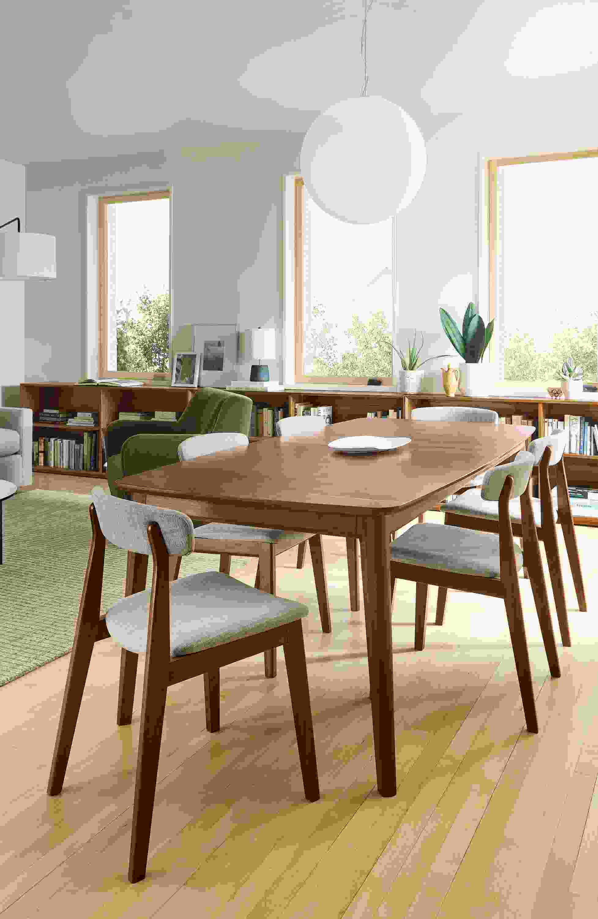 Dining area with Walcott 86-wide extension table in walnut and 6 Errol side chairs in walnut with Warner Putty.