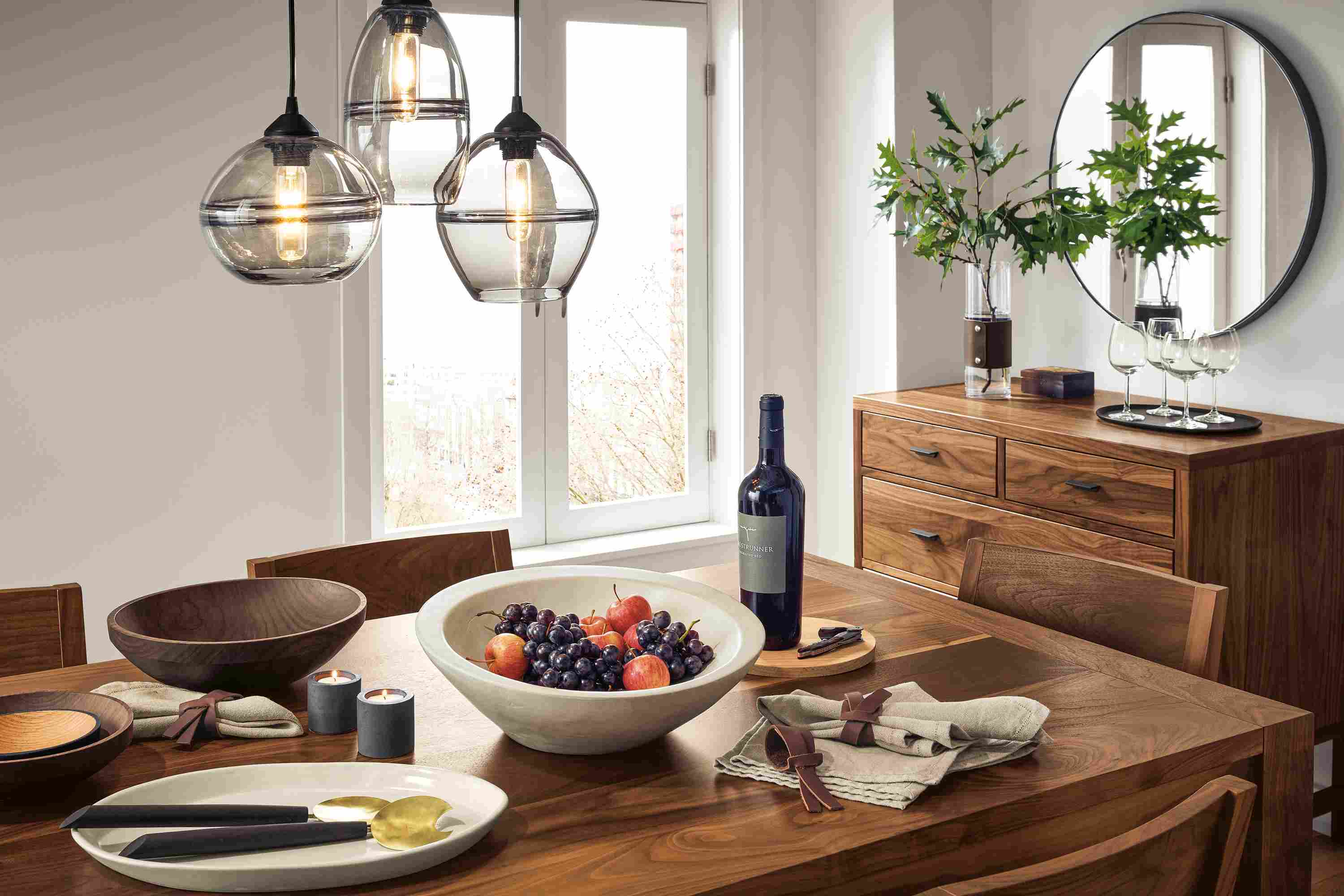 Dining room with Walsh dining table, Afton side chairs and Berkeley dresser all in walnut.