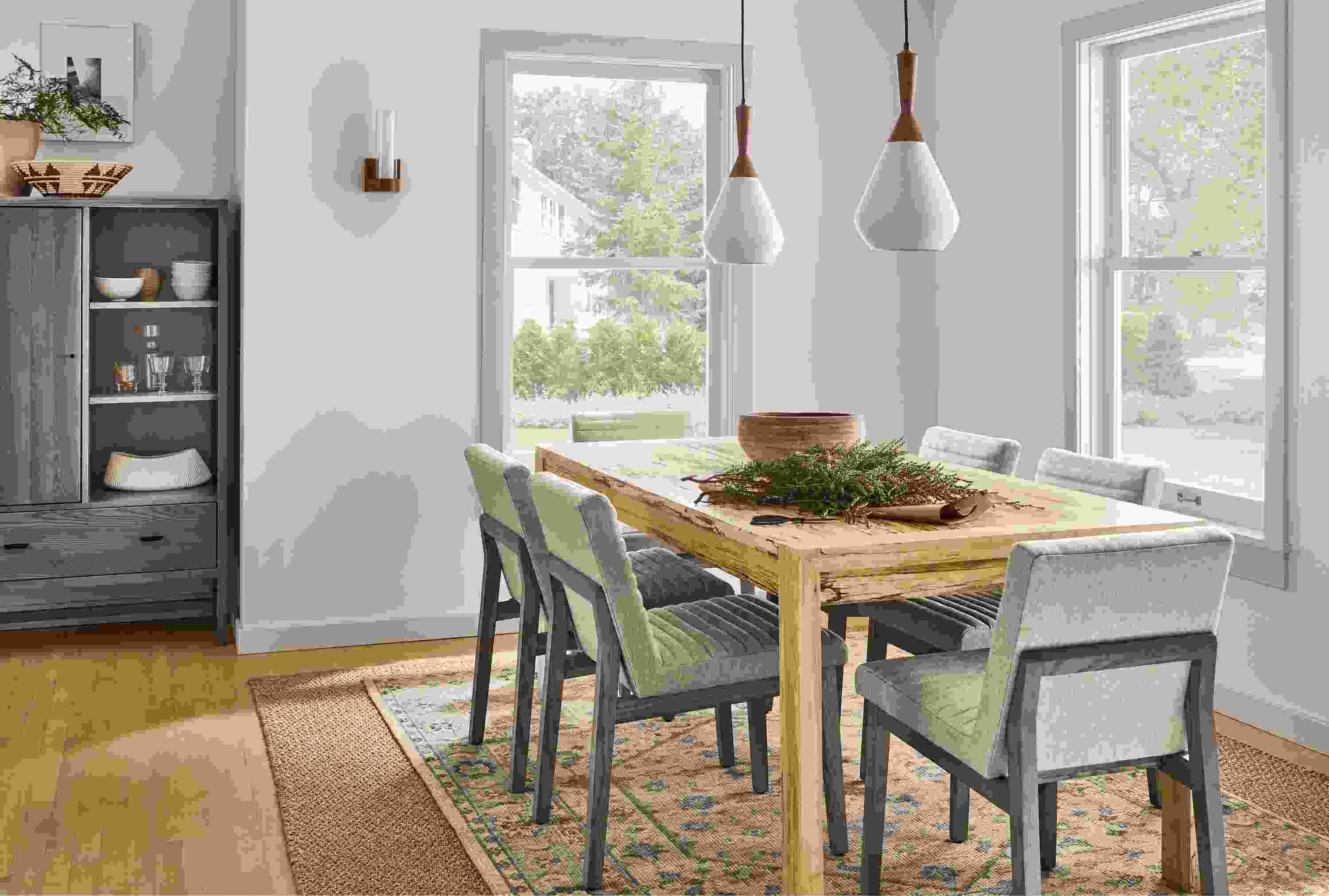 Dining room with 72-wide Walsh extension dining table, 6 Olsen dining chairs, Berkeley storage cabinet, essence rug.