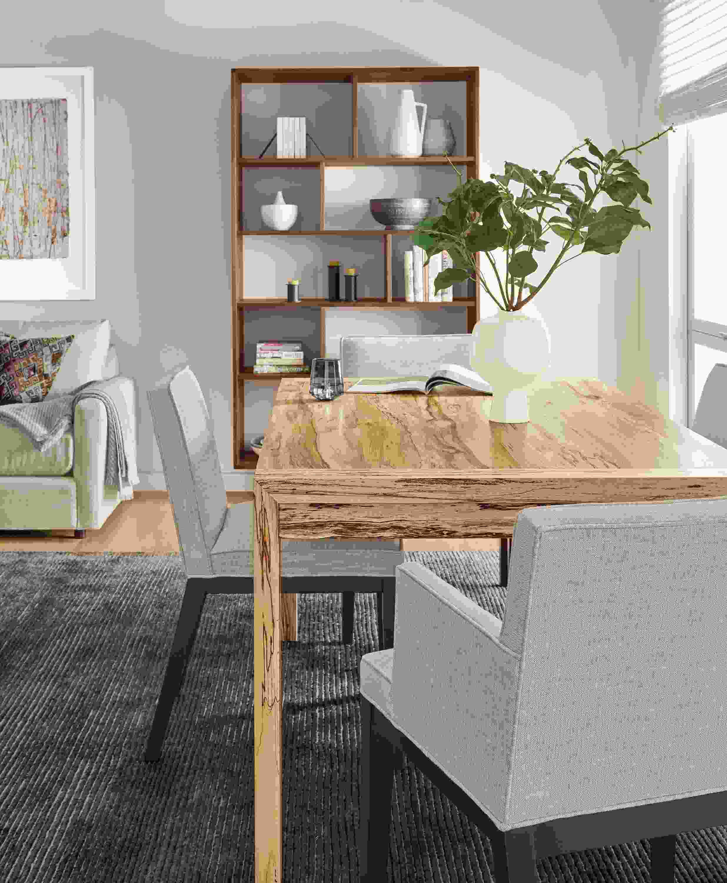 Dining room with Walsh table in spalted sugarberry and Ansel chairs in Destin Linen and Talia rug in charcoal.