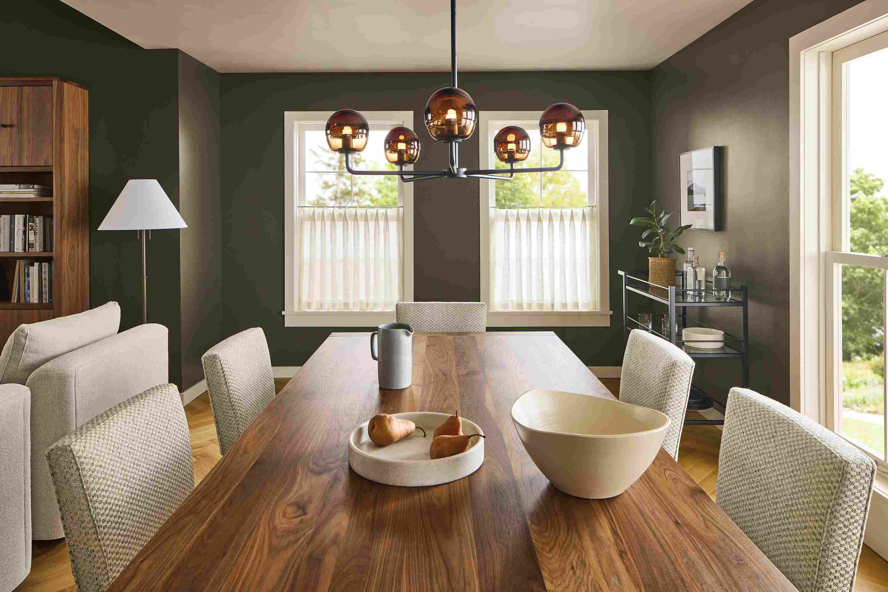 Dining room with detail of Walsh dining table in walnut and 6 Georgia side chairs in Lang Grey.