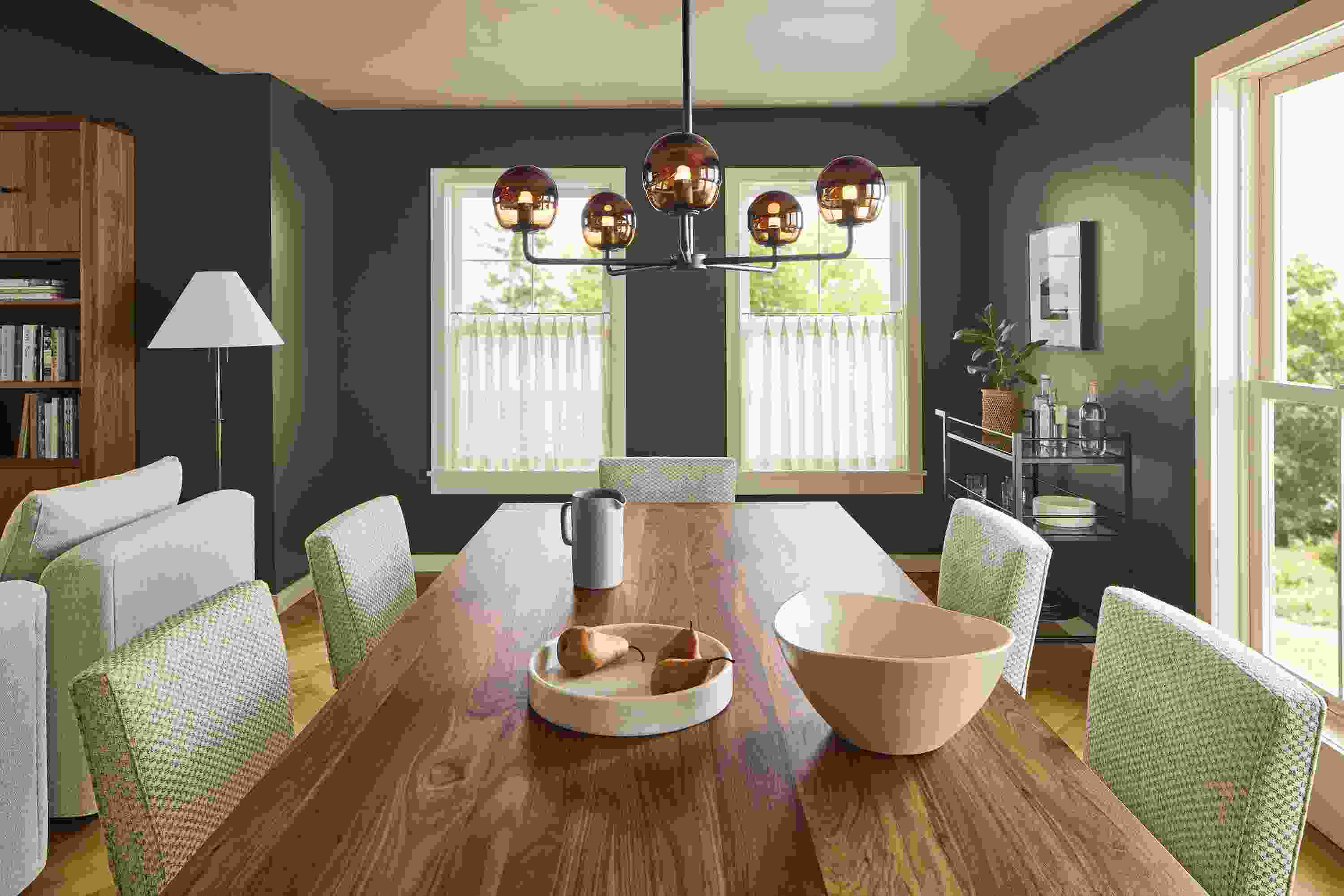 Dining room with detail of Walsh dining table in walnut and 6 Georgia side chairs in Lang Grey.