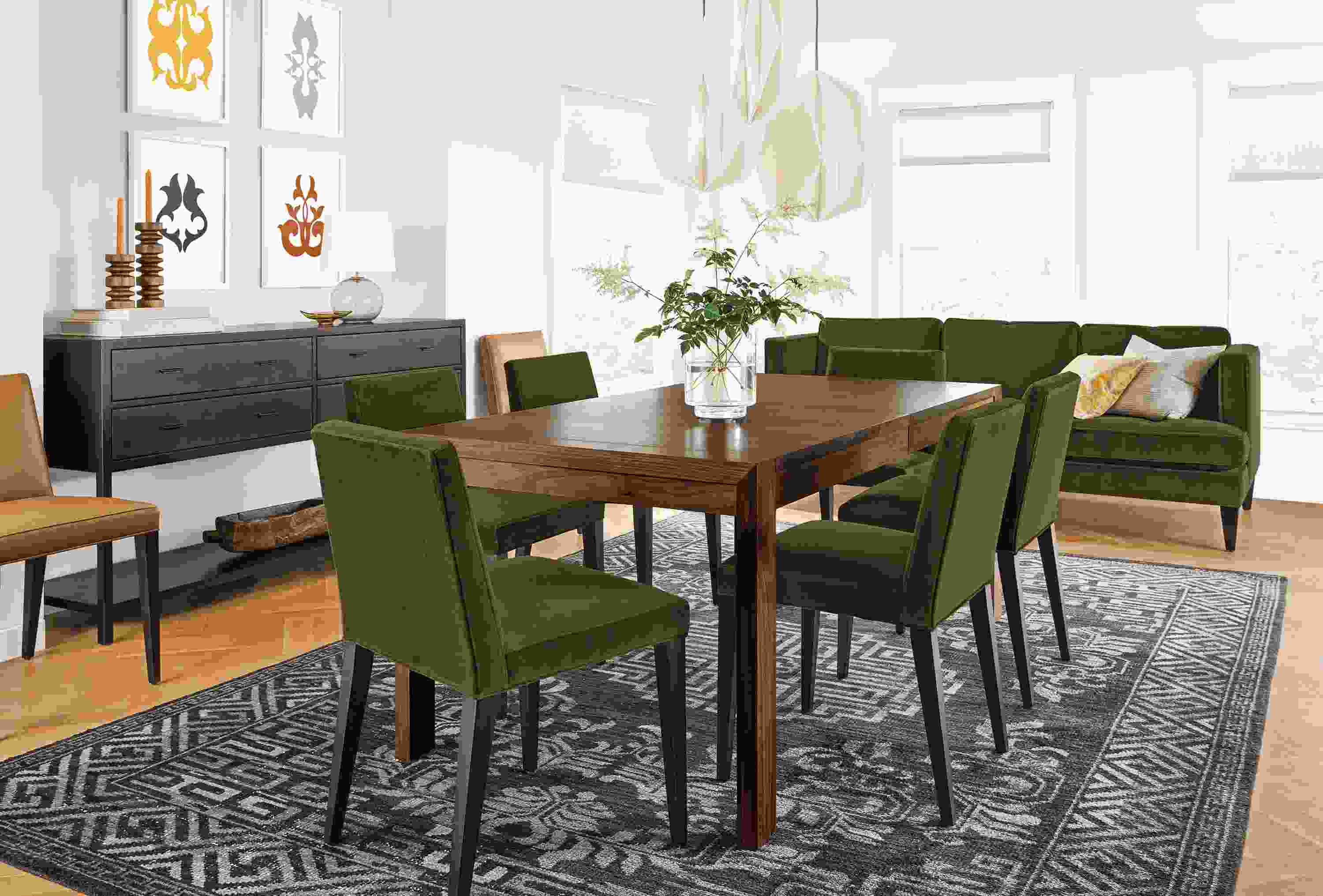 Great room with Walsh extension dining table in walnut and Ava side chairs in Vance Olive and Lecco Camel.