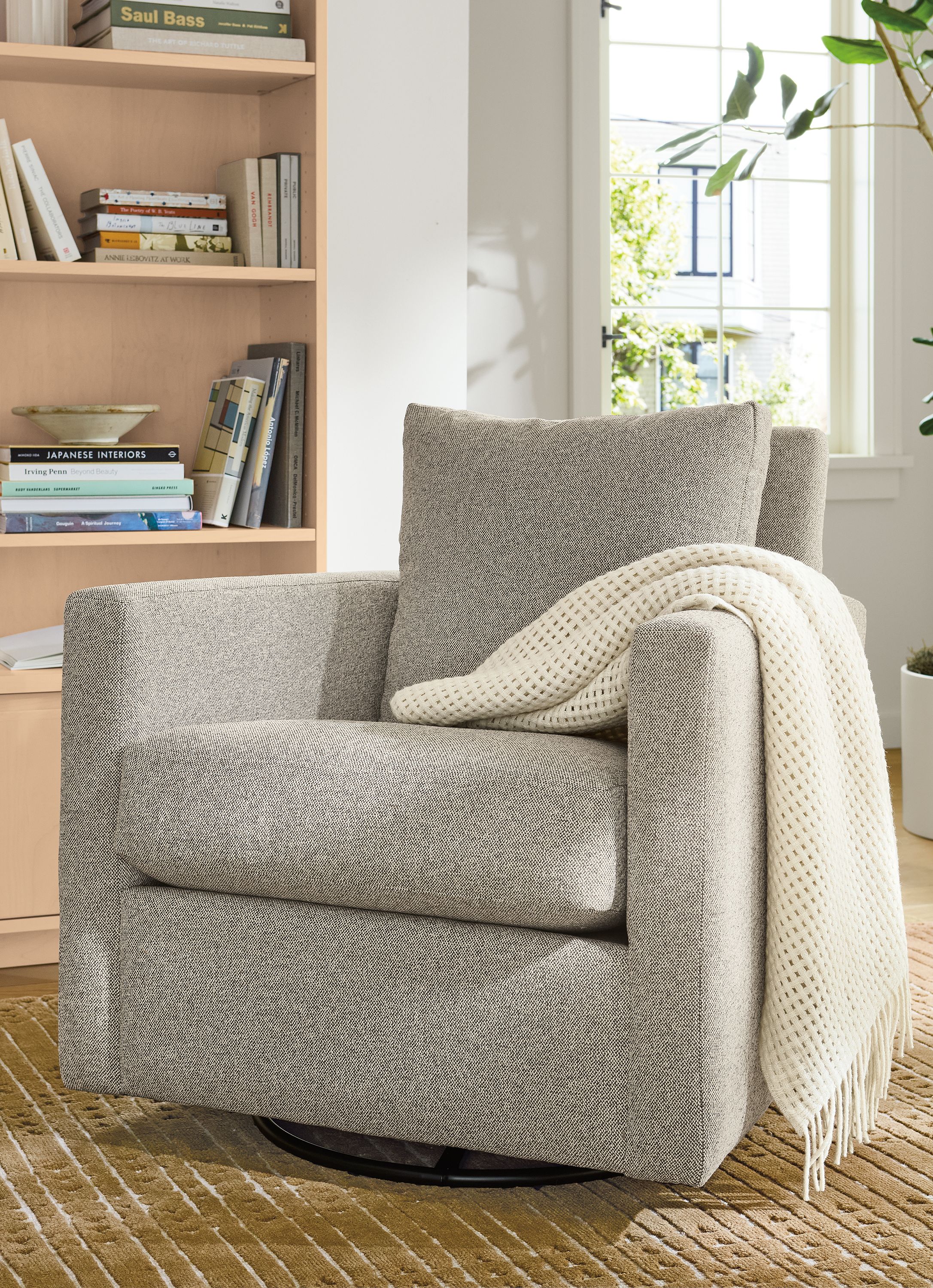 Swivel glider in Tatum bone fabric