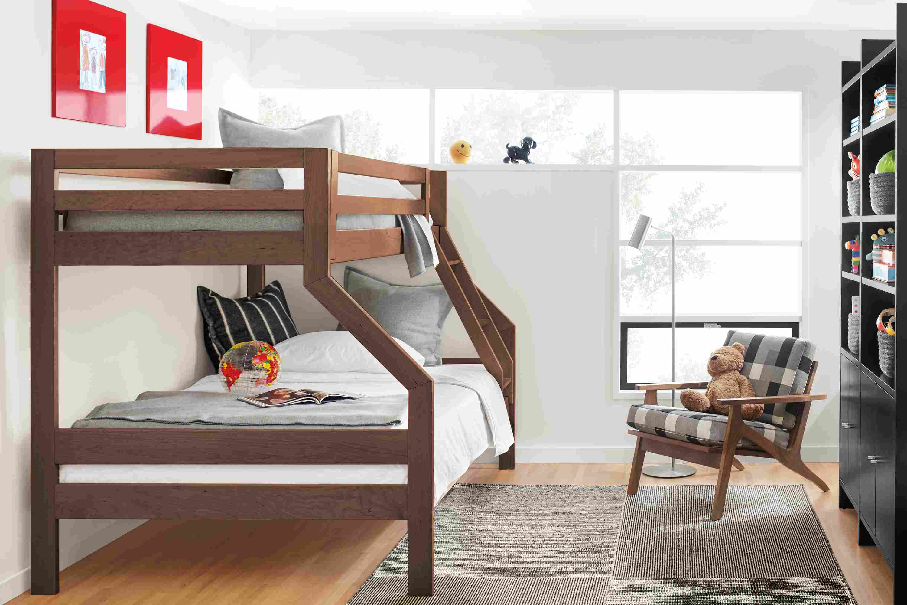 Children's room with Waverly duo bunk bed, Sanna chair, Addison bookcases and Traverse rug.