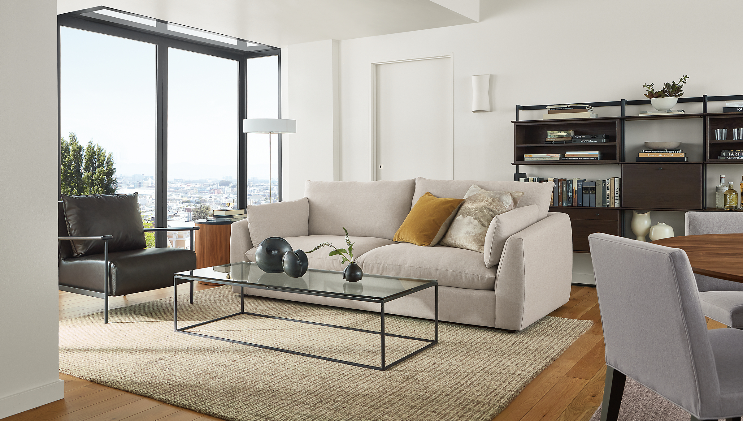 living room with weber sofa, tyne coffee table, xavier chair.