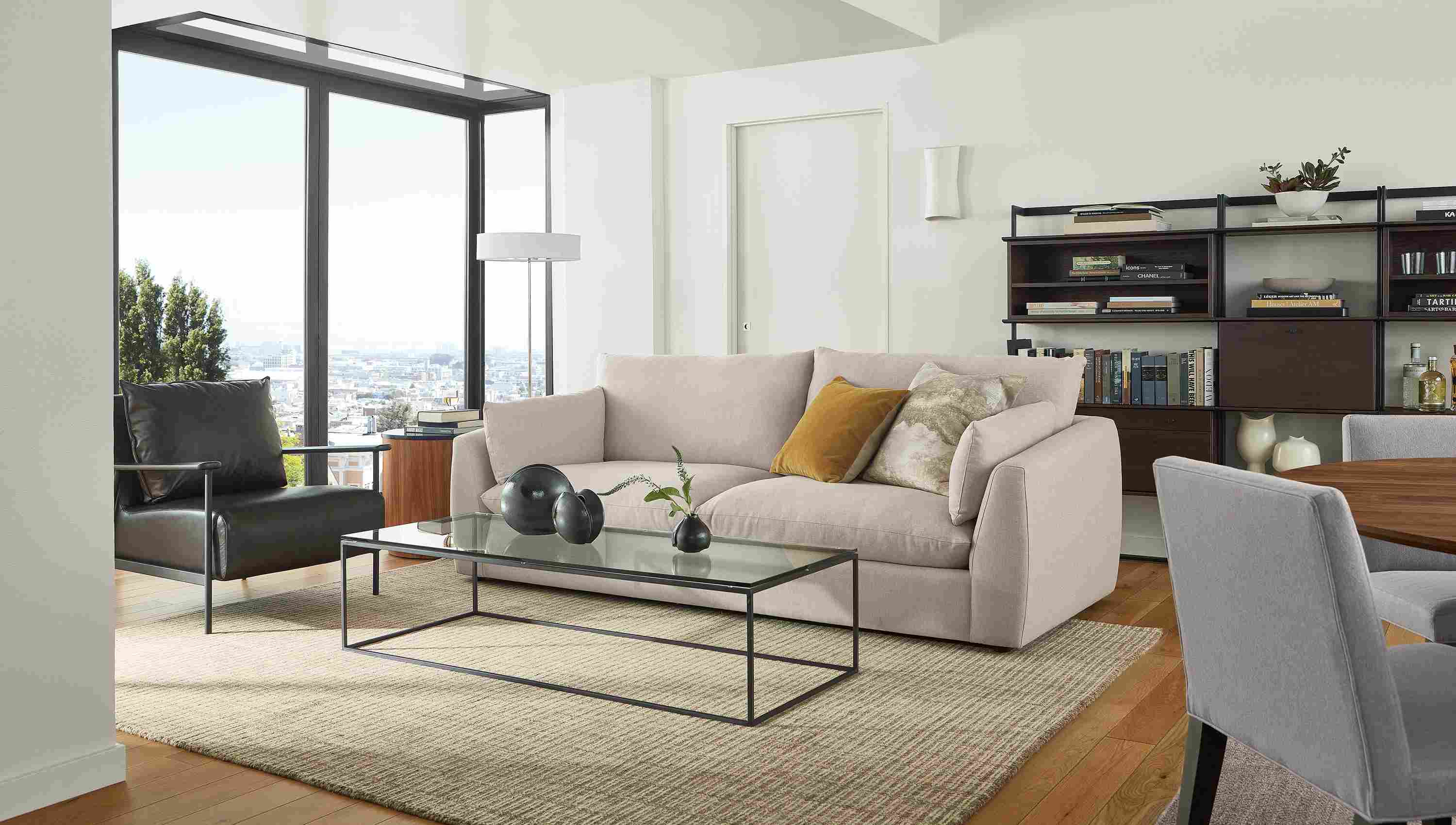 Living room with Weber sofa, Tyne coffee table, Xavier chair.