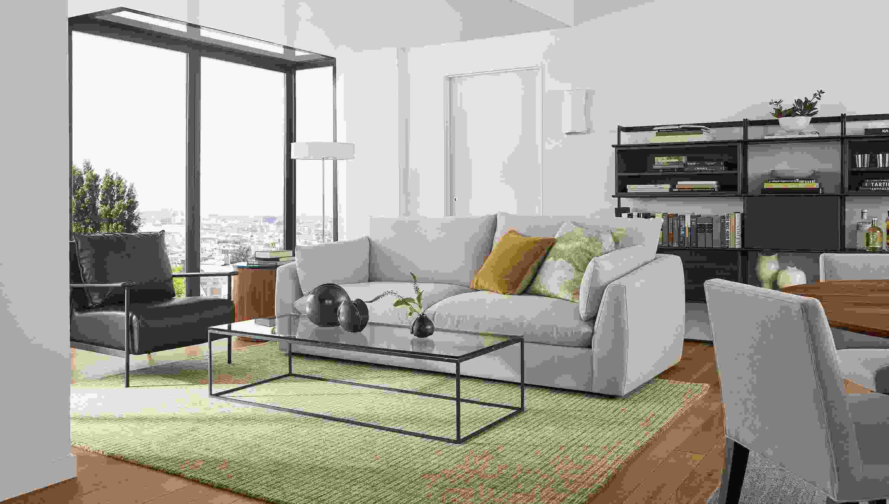 Living room with Weber sofa, Tyne coffee table, Xavier chair.