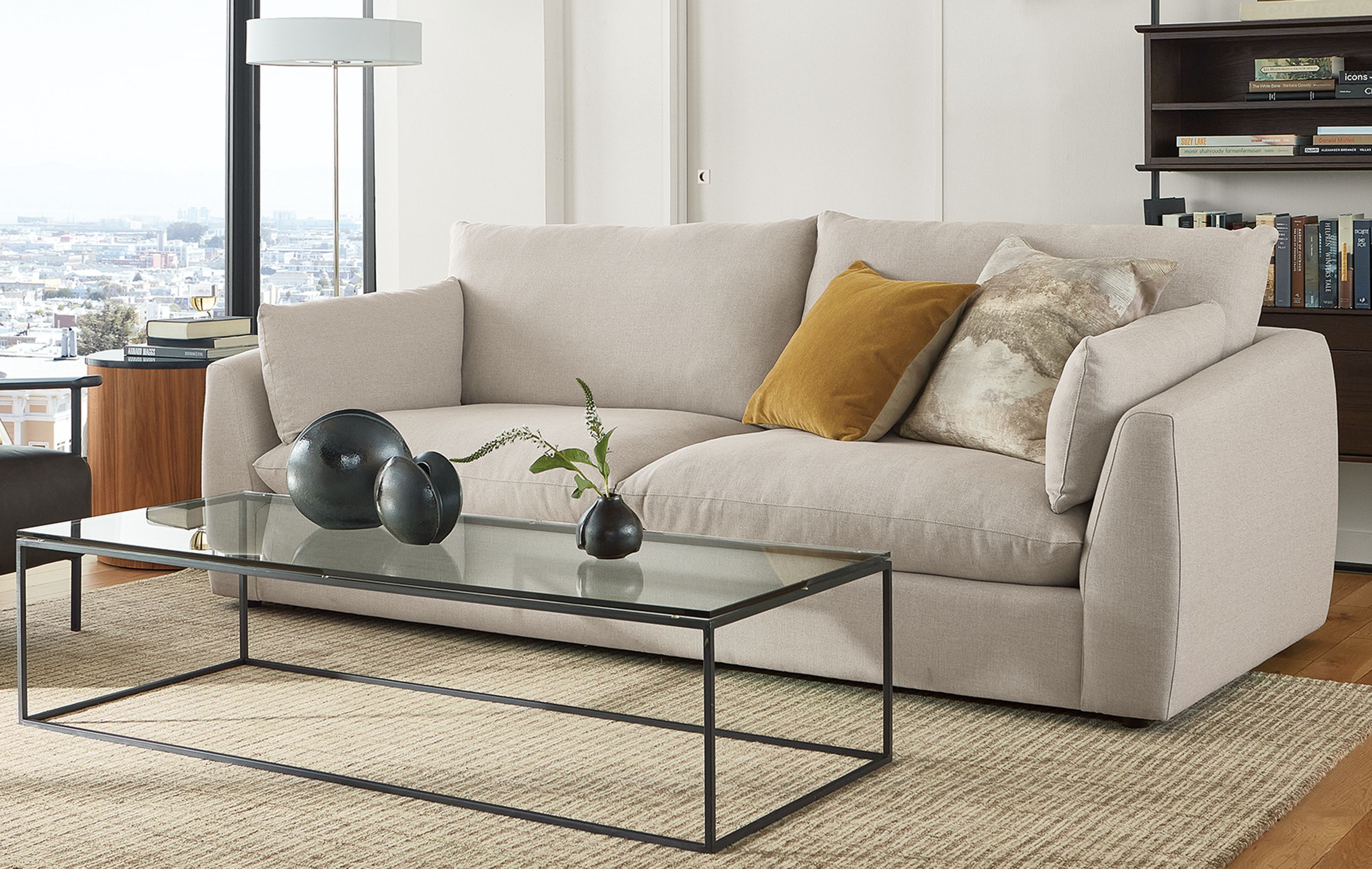 Living room with Weber sofa, Tyne coffee table, Xavier chair.