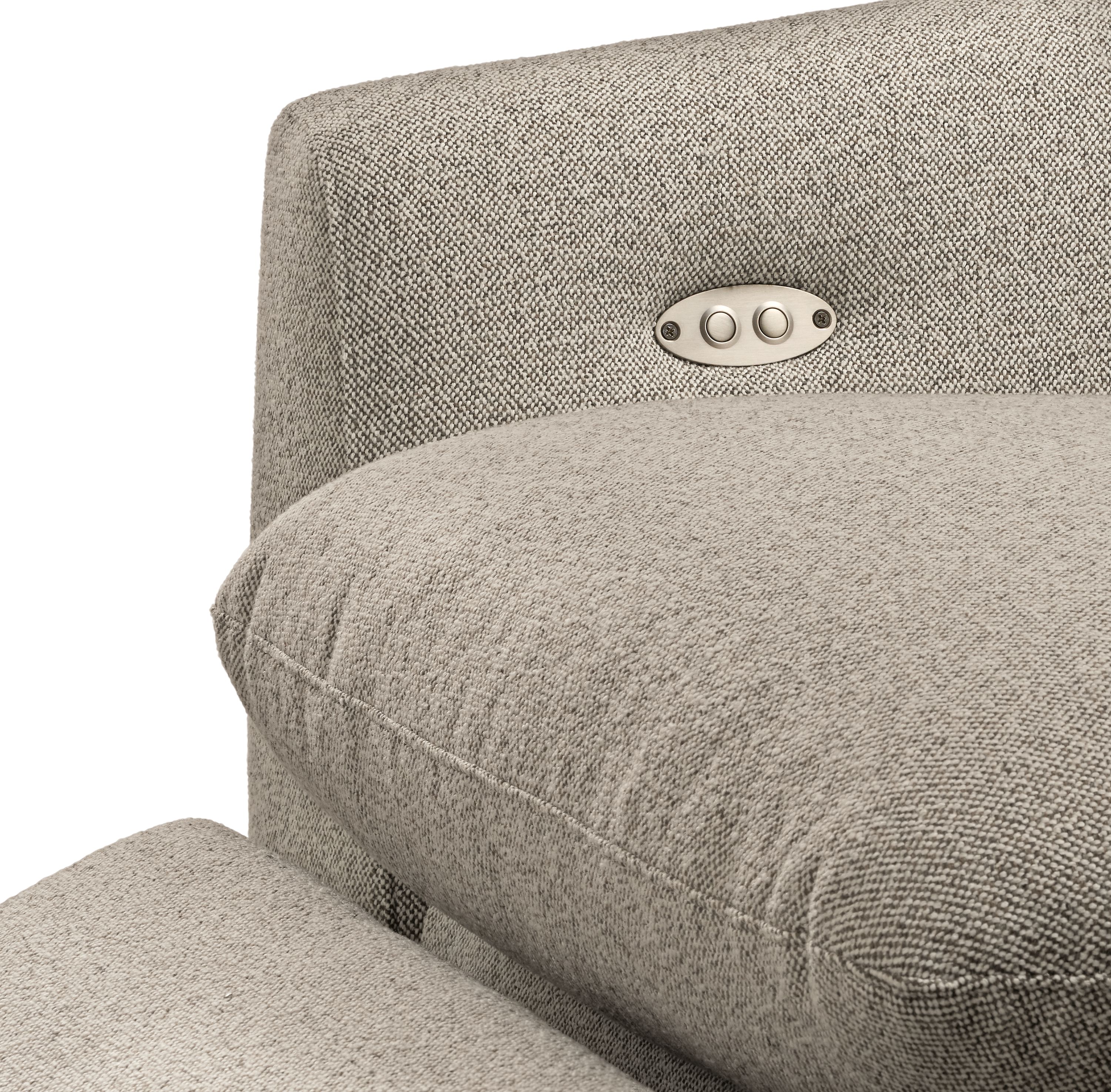 Detail of adjustment buttons on a weber power recliner chair in tatum bone.