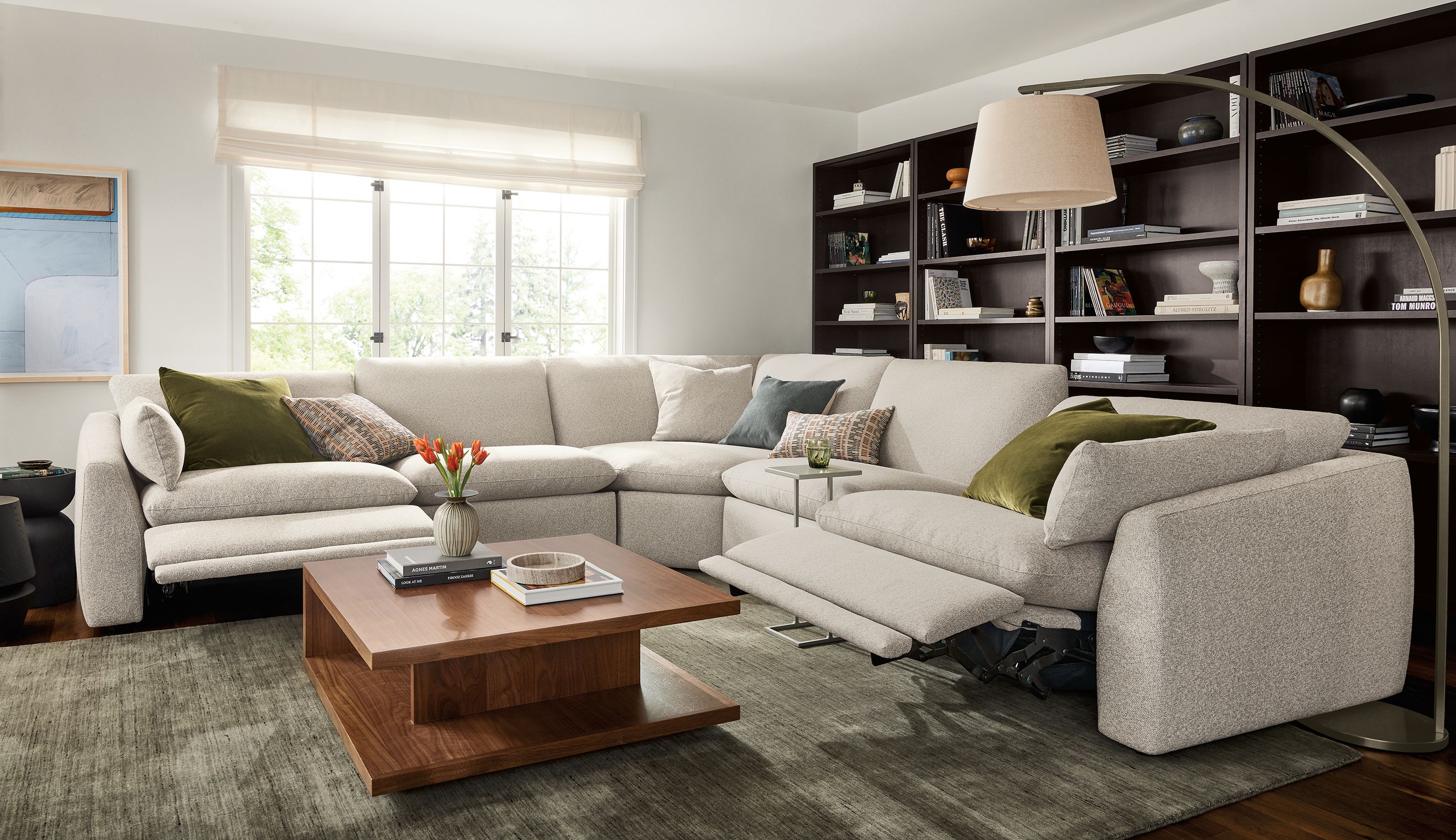 Large living room with Weber 133 by 133 5-piece sectional power recliner in tatum bone and graham coffee table in walnut.