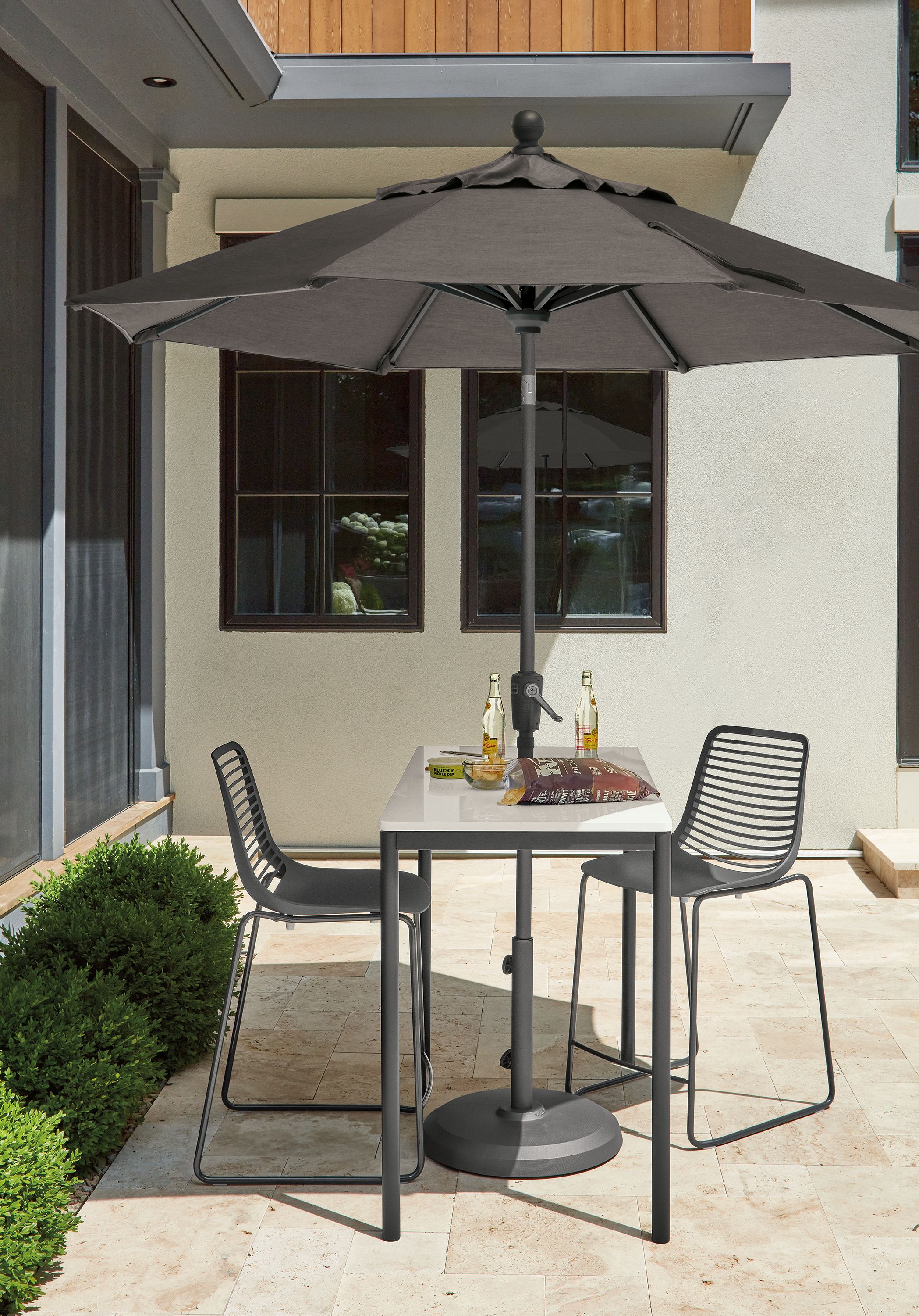 7.5' round patio umbrella in Tavros charcoal fabric