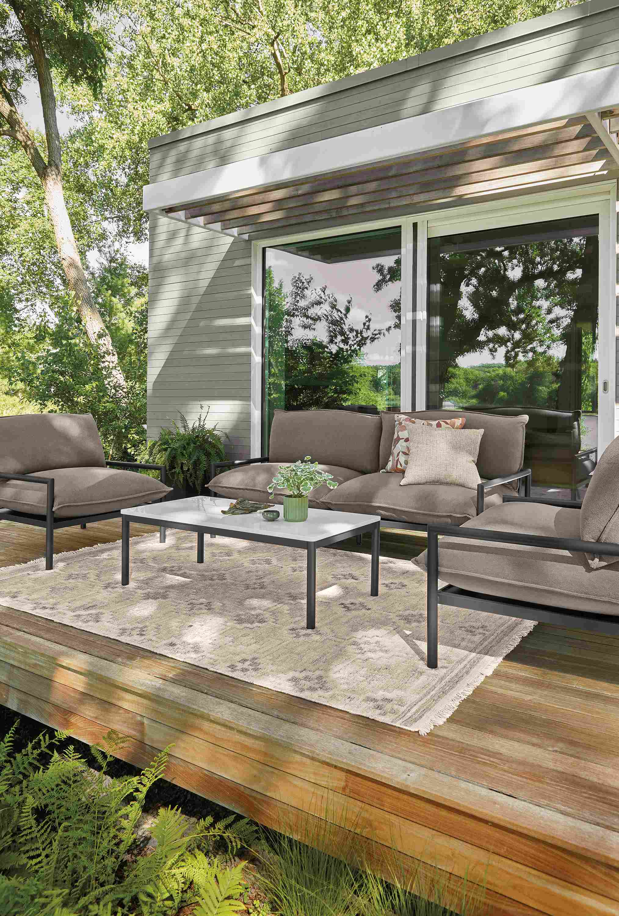 Deck with Westbrook sofa and 2 lounge chairs in dusk putty and graphite.
