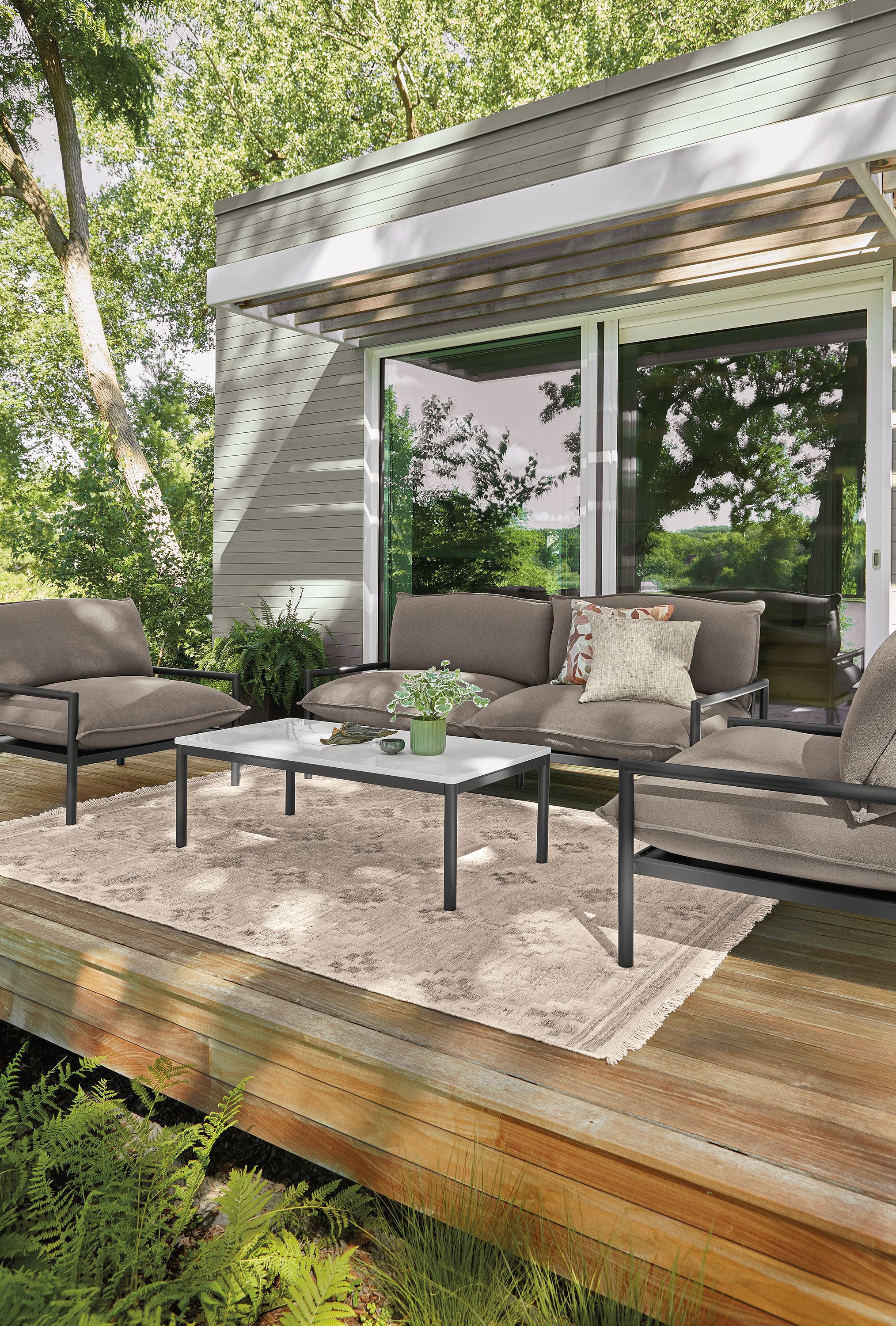 Deck with Westbrook sofa and 2 lounge chairs in dusk putty and graphite.