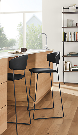 Side detail of Wolfgang synthetic leather stools.