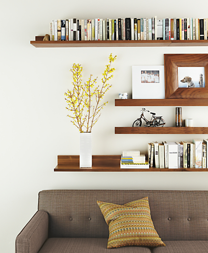 Living room with Wall shelf in walnut.