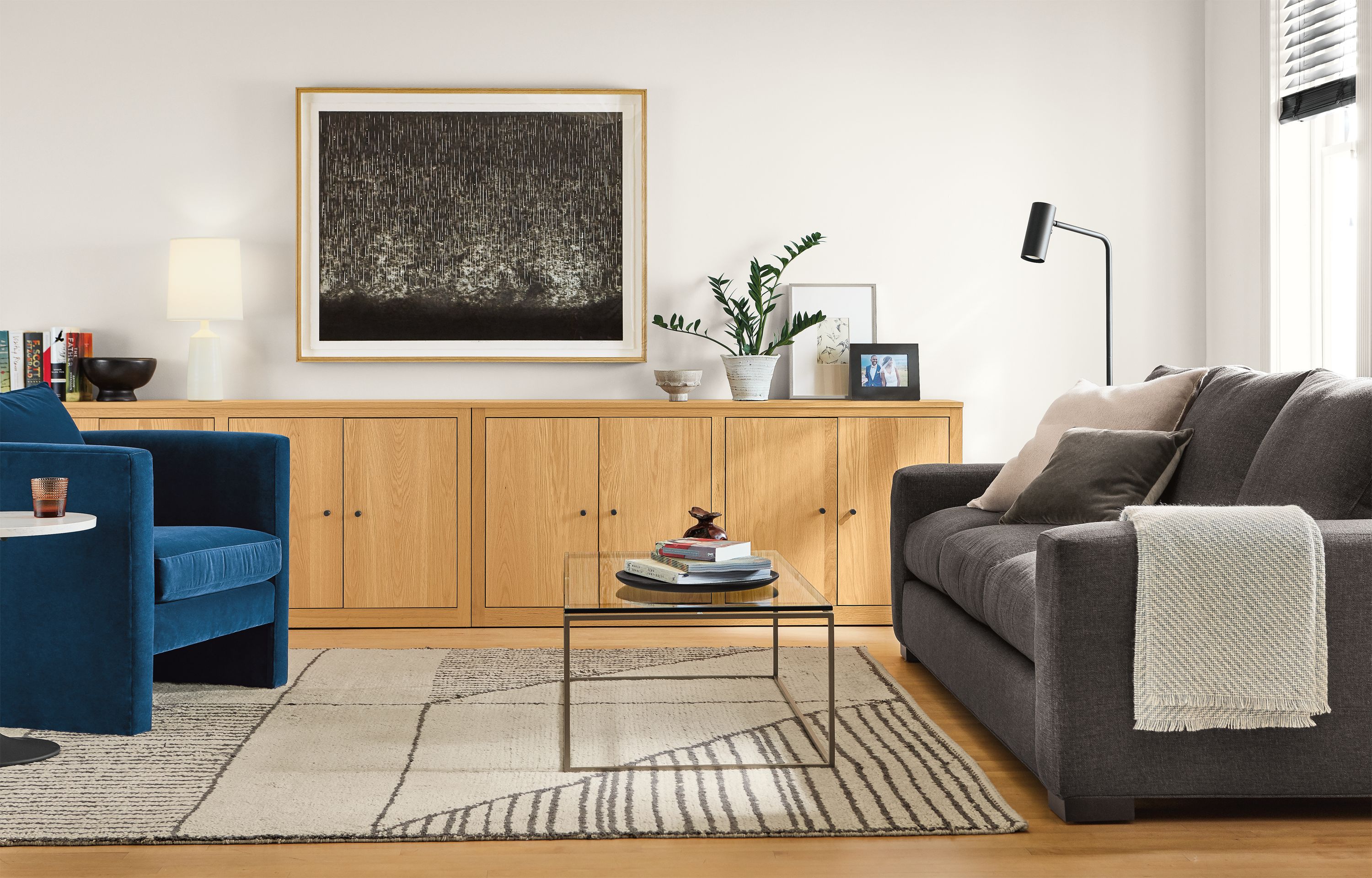 Detail of living room with Metro sofa, Silva chair and Woodwind bookcases.