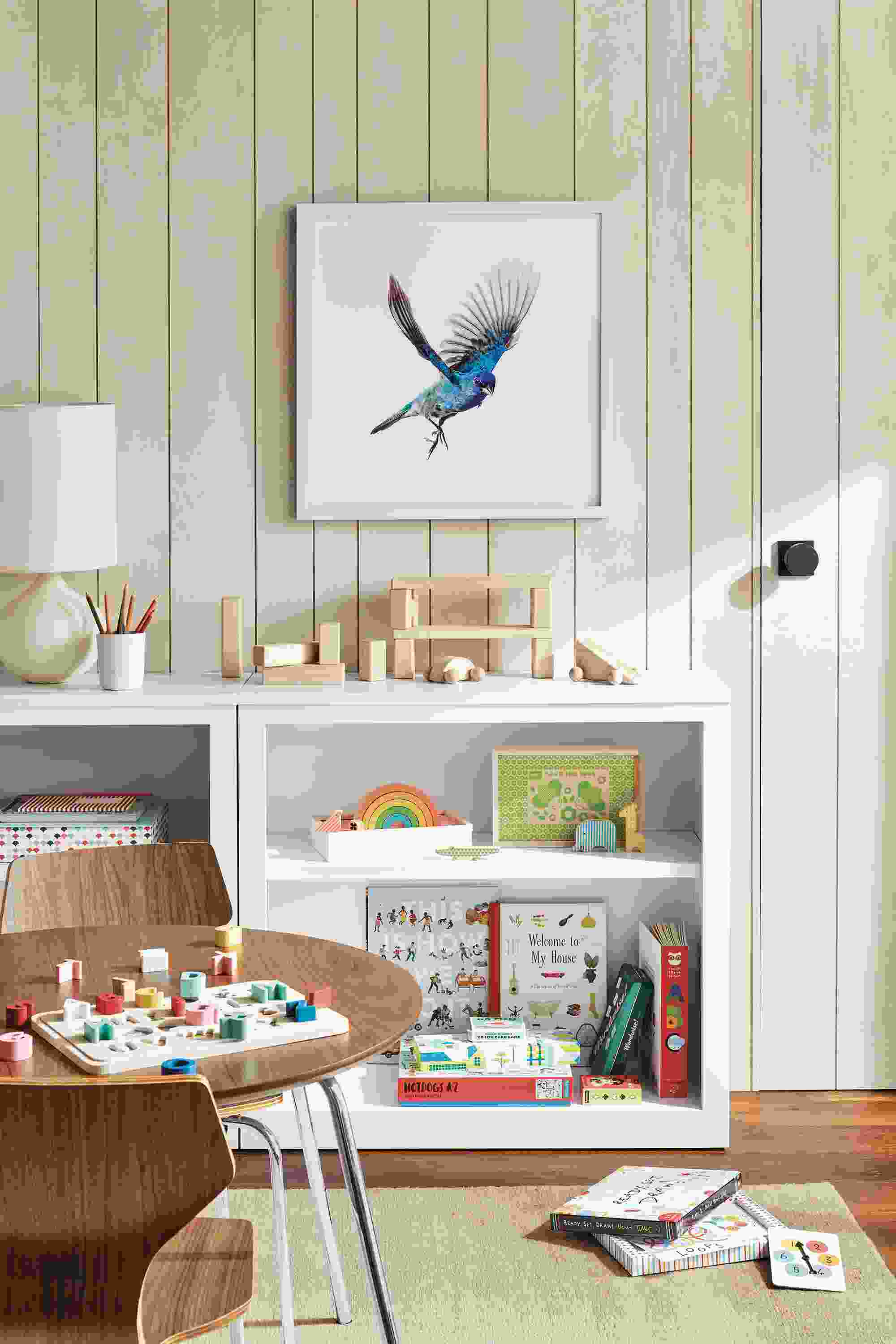 Kid's playroom with two Woodwind bookcases, perch table, perch chair, impression rug.