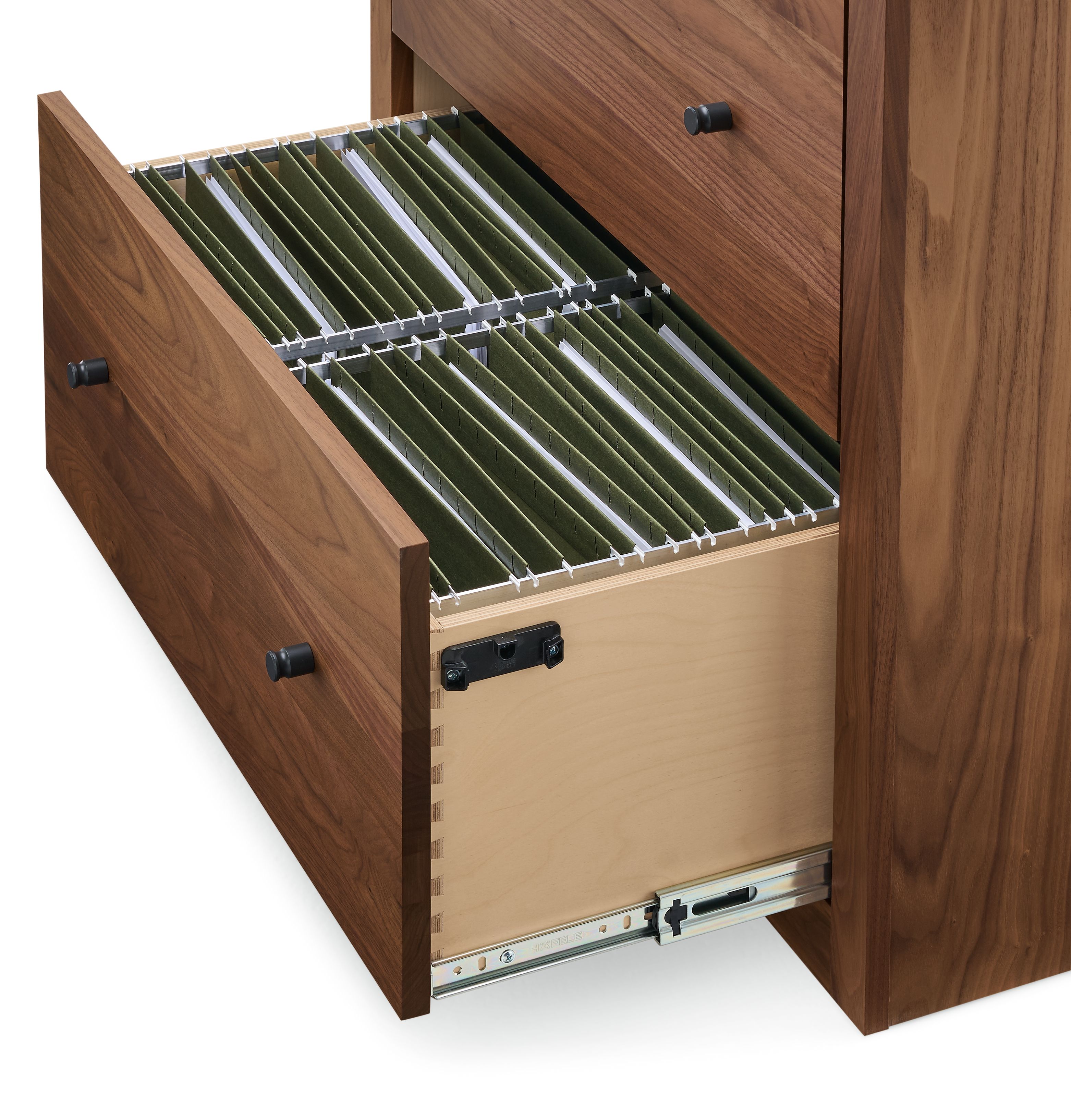Open drawer detail of a Woodwind 32-wide 2-file drawer cabinet in walnut showing letter size file folders.