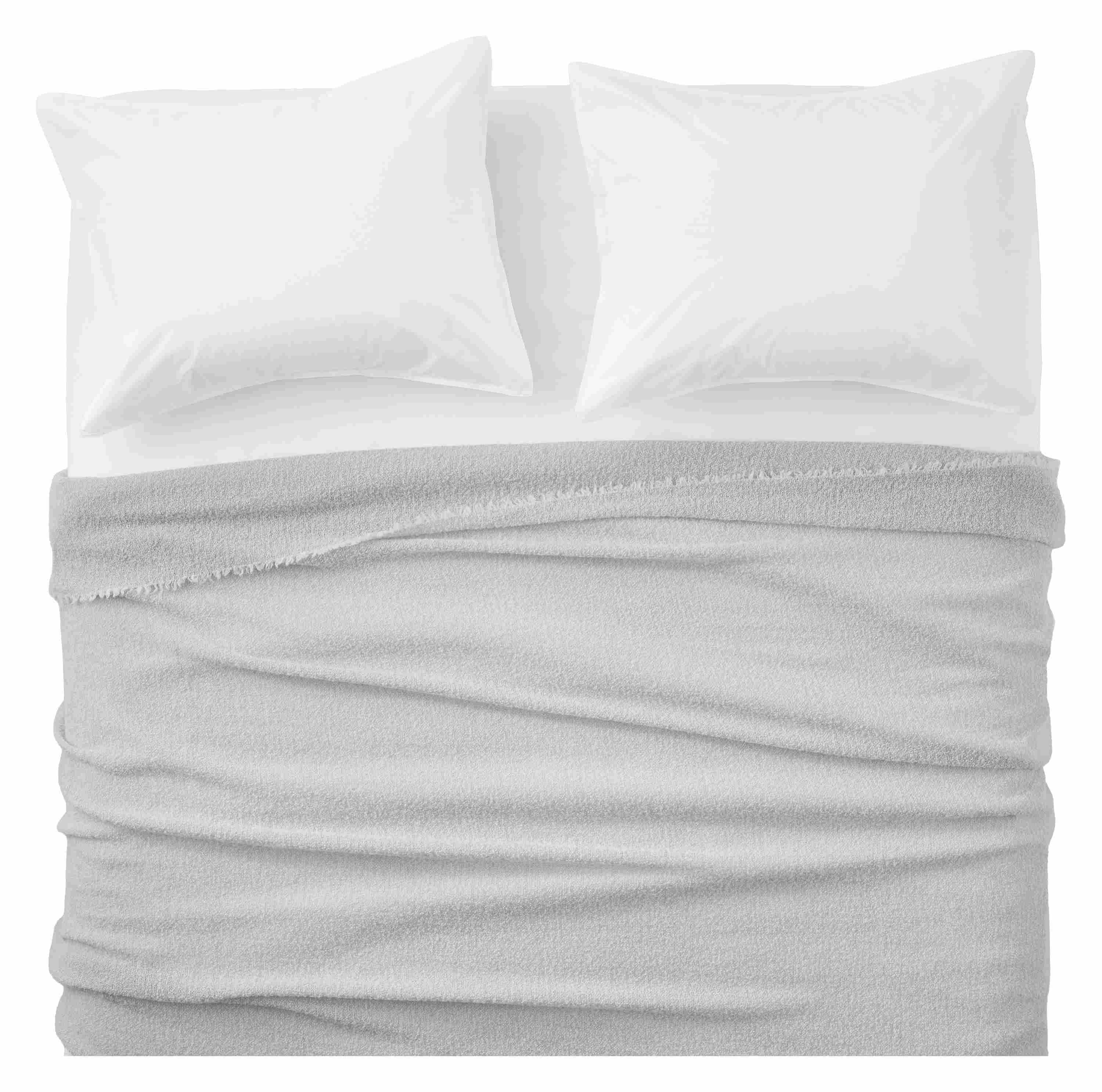 Overhead view of Core queen bed with Wool Boucle blanket in bone and Signature percale shams and sheets in white.