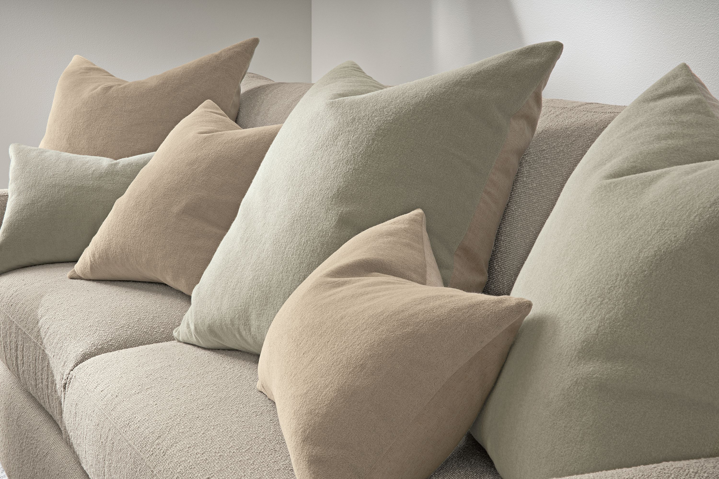 24w 24h, 20w 20h & 20w 13h pillows in sand; 20w 13h, 24w 24h & 20w 20h pillows in grey
