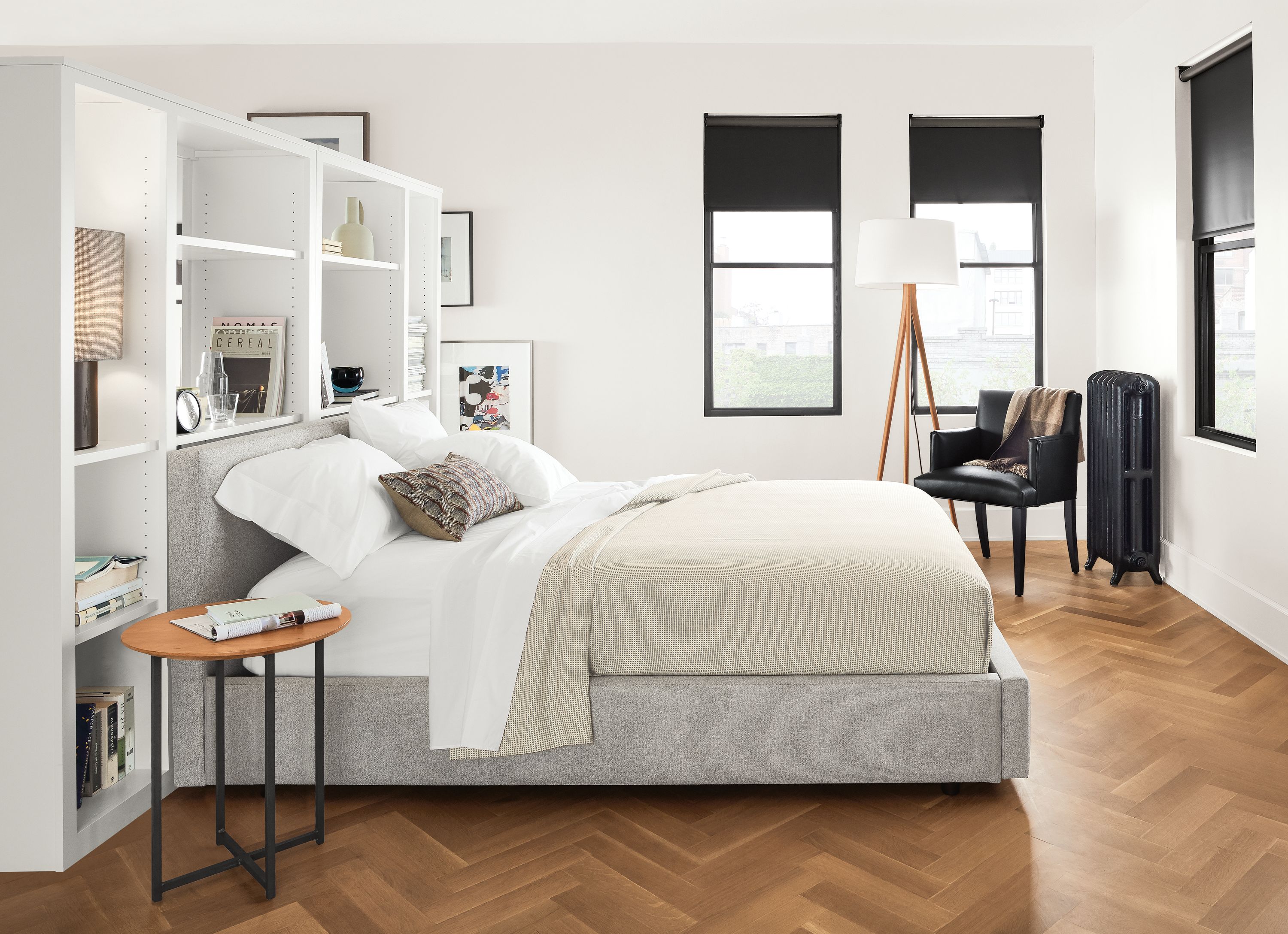 Detail of Wyatt queen bed in boyer grey fabric in bedroom.