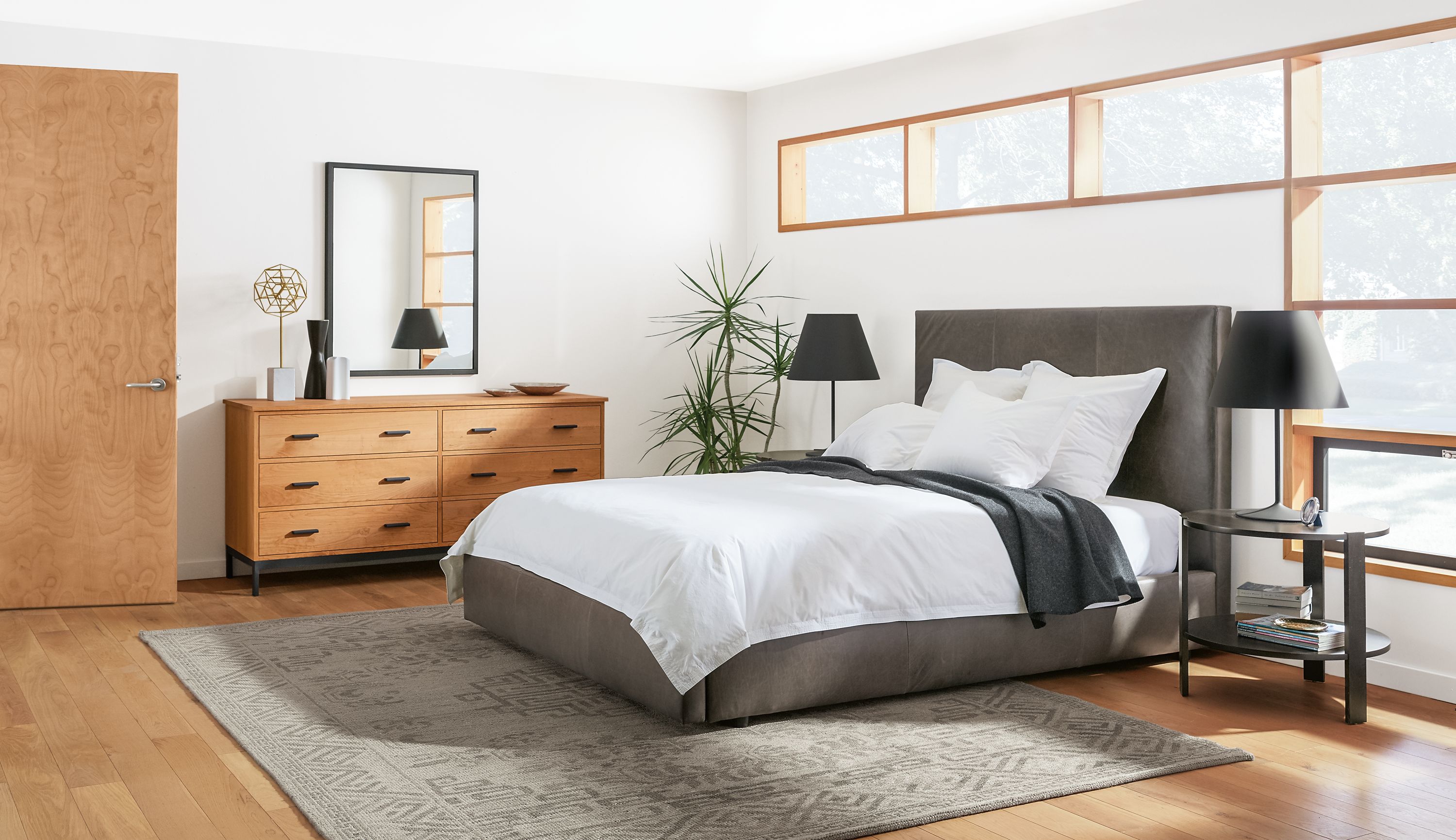 Large bedroom with Wyatt queen storage bed, Greene end tables, 67-wide linear dresser.