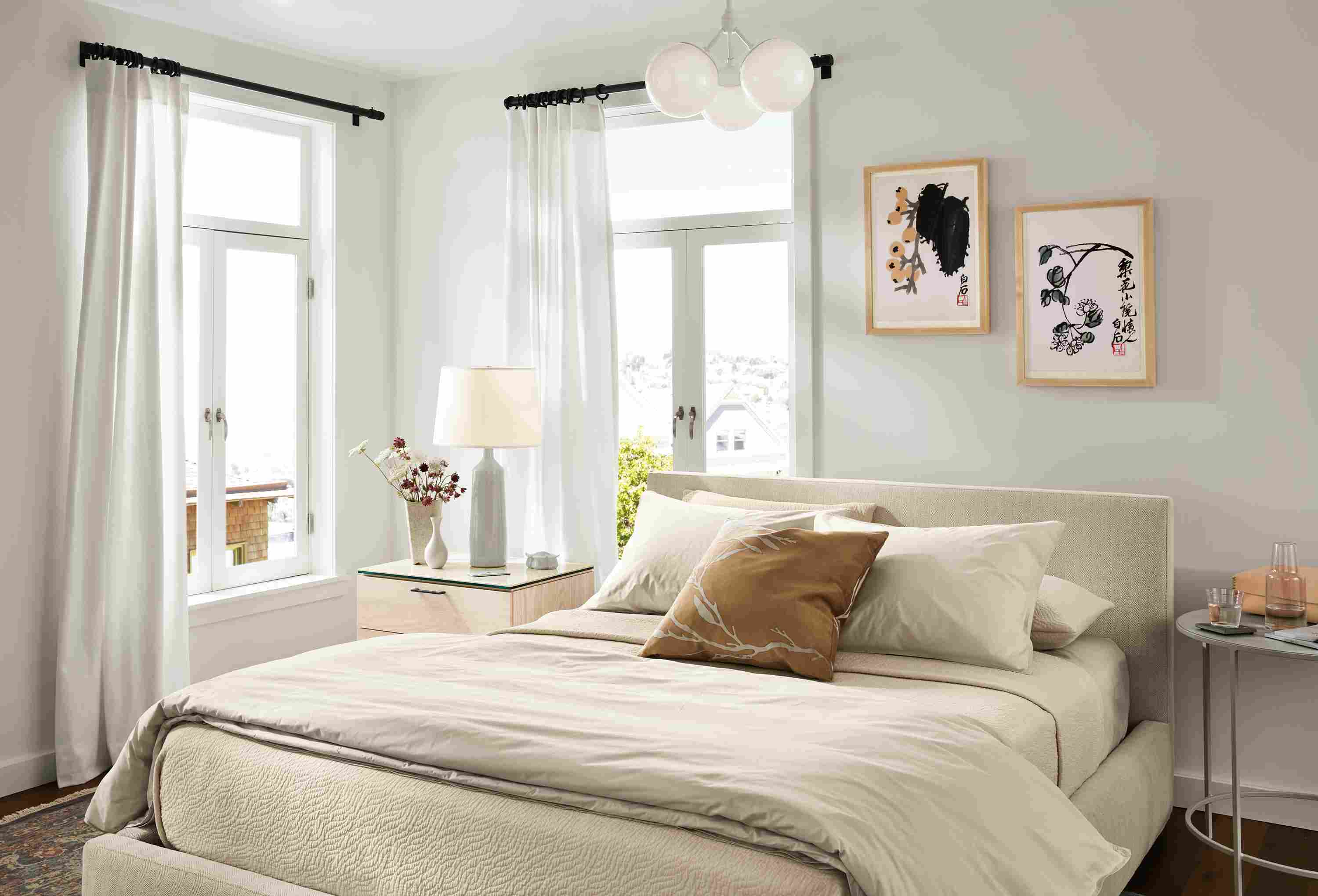 Room setting including Wyatt bed in Frond Natural with Kenwood nightstand, slim end table and Vesuvio rug.