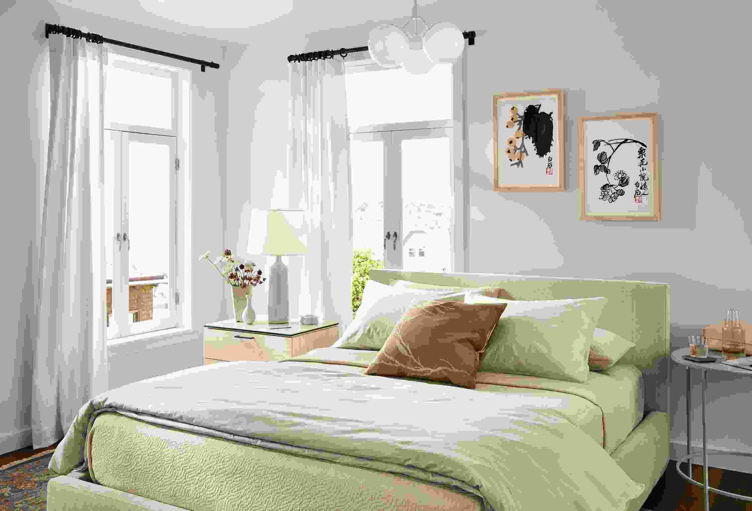 Room setting including Wyatt bed in Frond Natural with Kenwood nightstand, slim end table and Vesuvio rug.