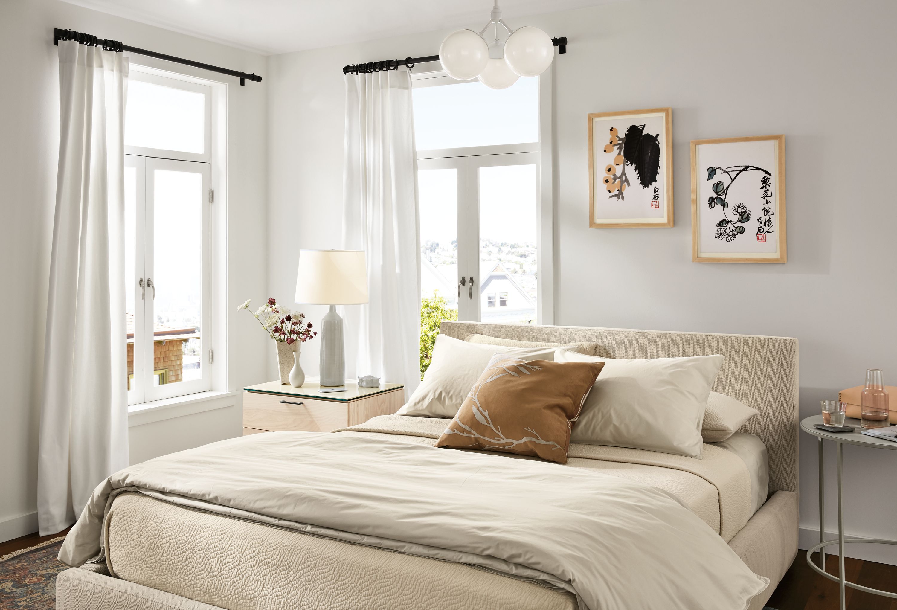 room setting including wyatt bed in frond natural with kenwood nightstand, slim end table and vesuvio rug.