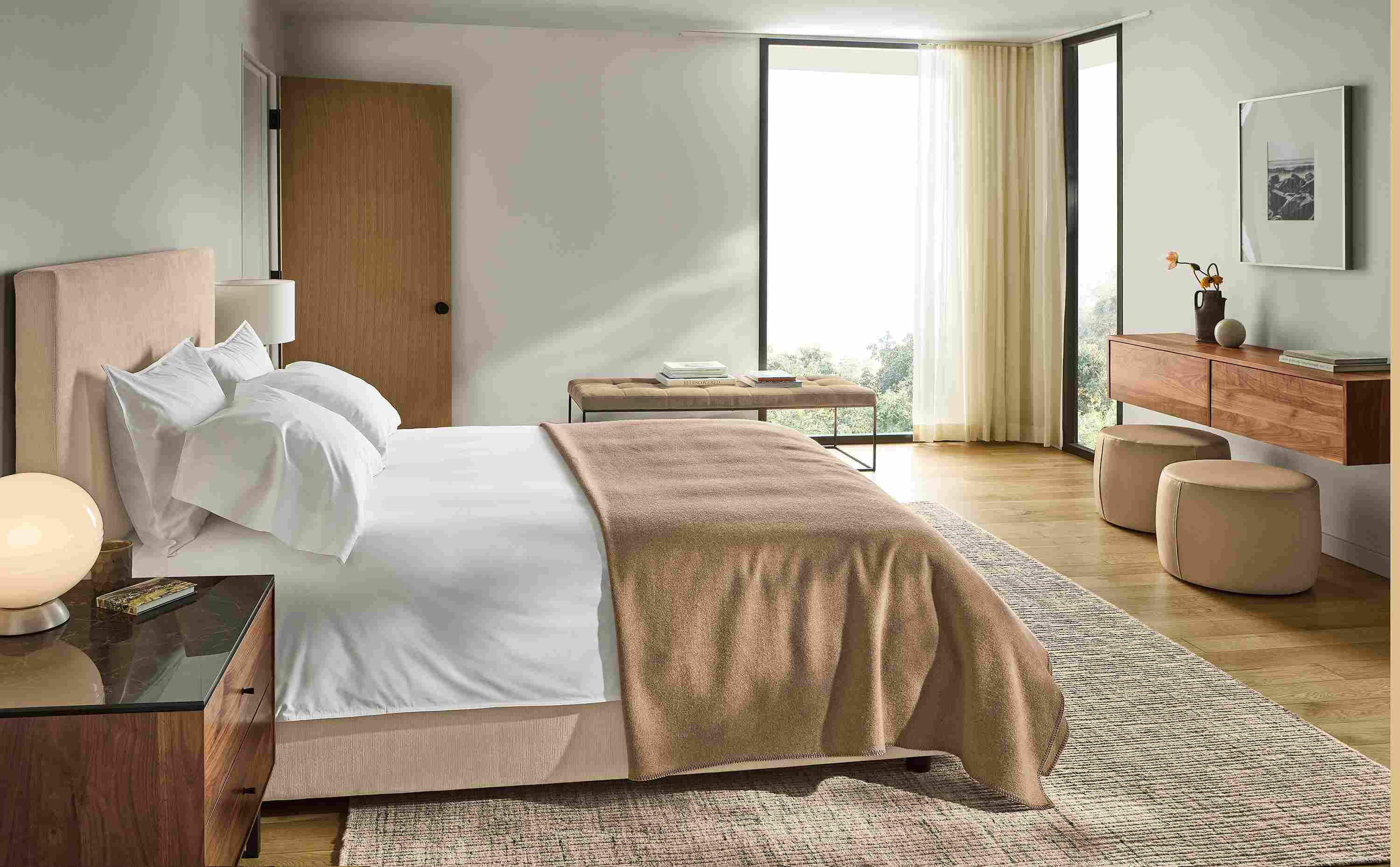 Bedroom with Wyatt queen bed in Nigel Natural, Hover wall mounted cabined in walnut and Tyne bench in Windsor Otter.