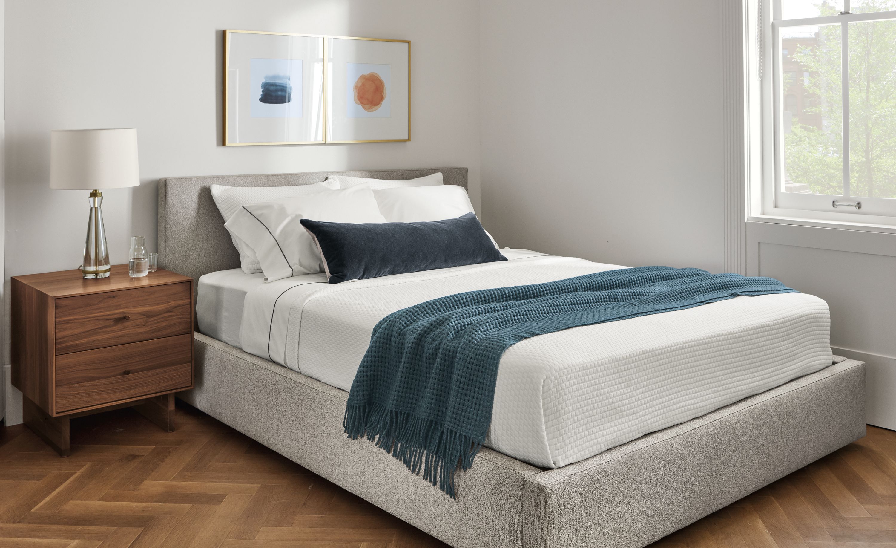 Bedroom with Wyatt queen bed in Boyer Grey with Hudson nightstand, Gatsby table lamp.
