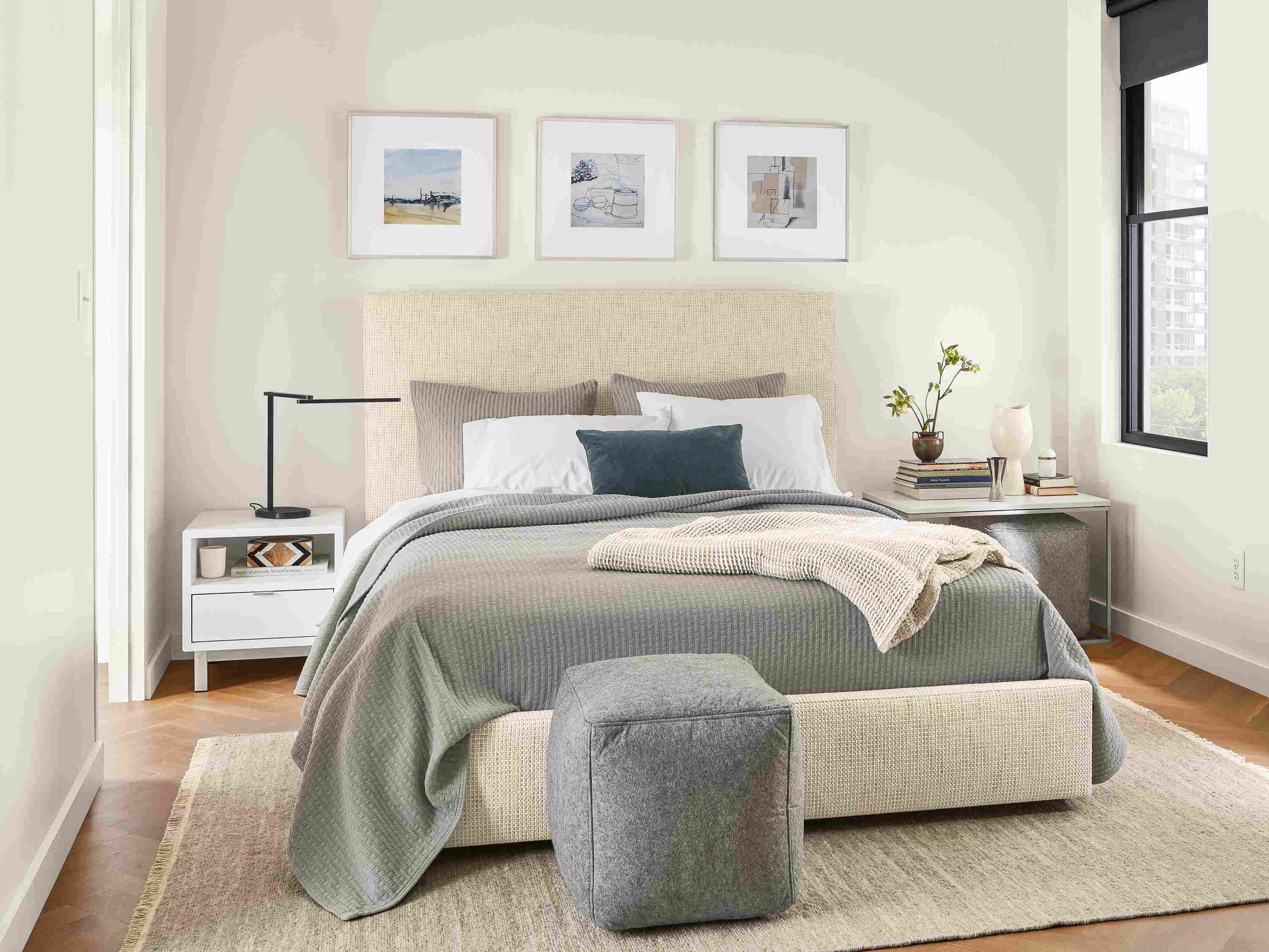 Detail of Wyatt queen storage bed in Hearth Oyster fabric in bedroom.