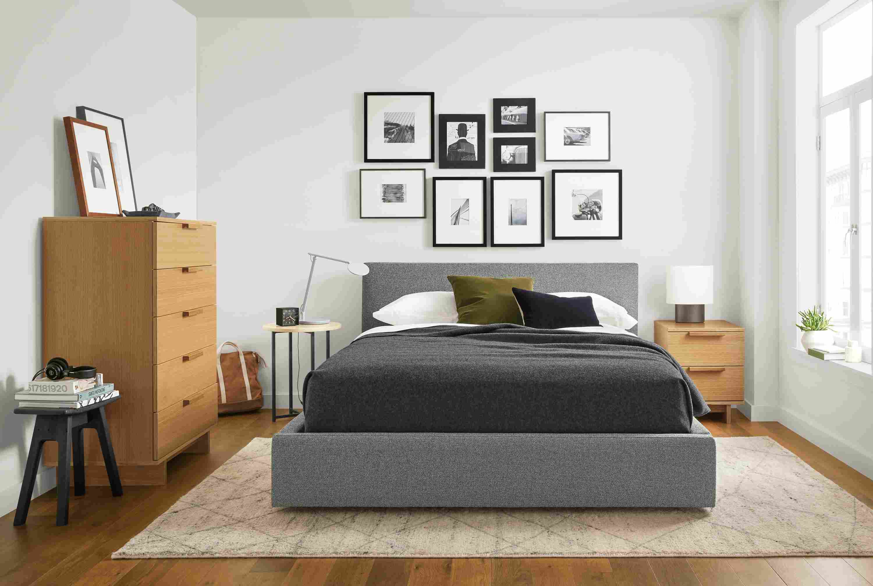 Bedroom with Wyatt queen storage bed in Tatum Spruce and Ashby dresser and nightstand in white oak veneer.